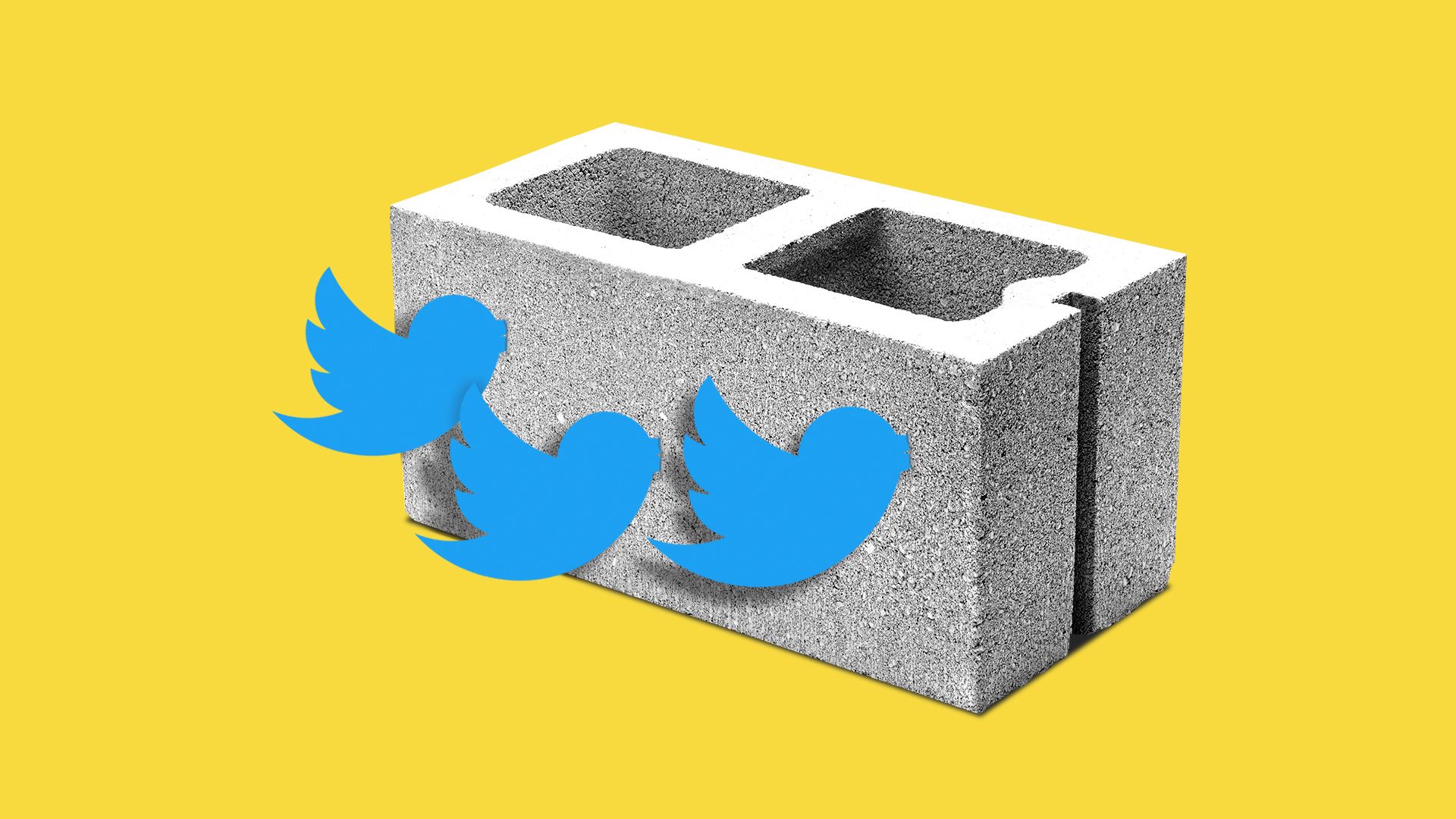Three blue birds, representing Twitter, flying past a cement block