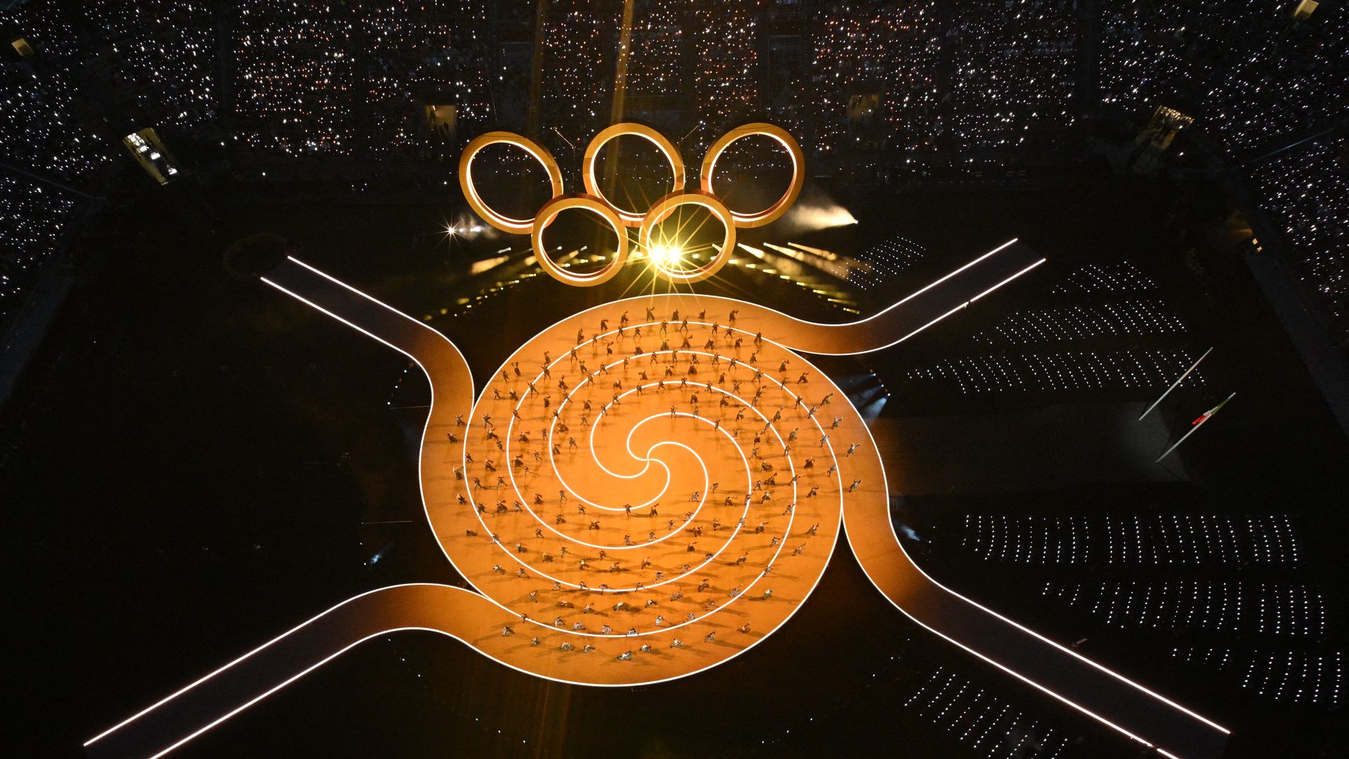 Rings form the Olympic emblem during the opening ceremony of the Milano Cortina 2026 Winter Olympic Games at the San Siro stadium in Milan, northern Italy, on February 6, 2026.
