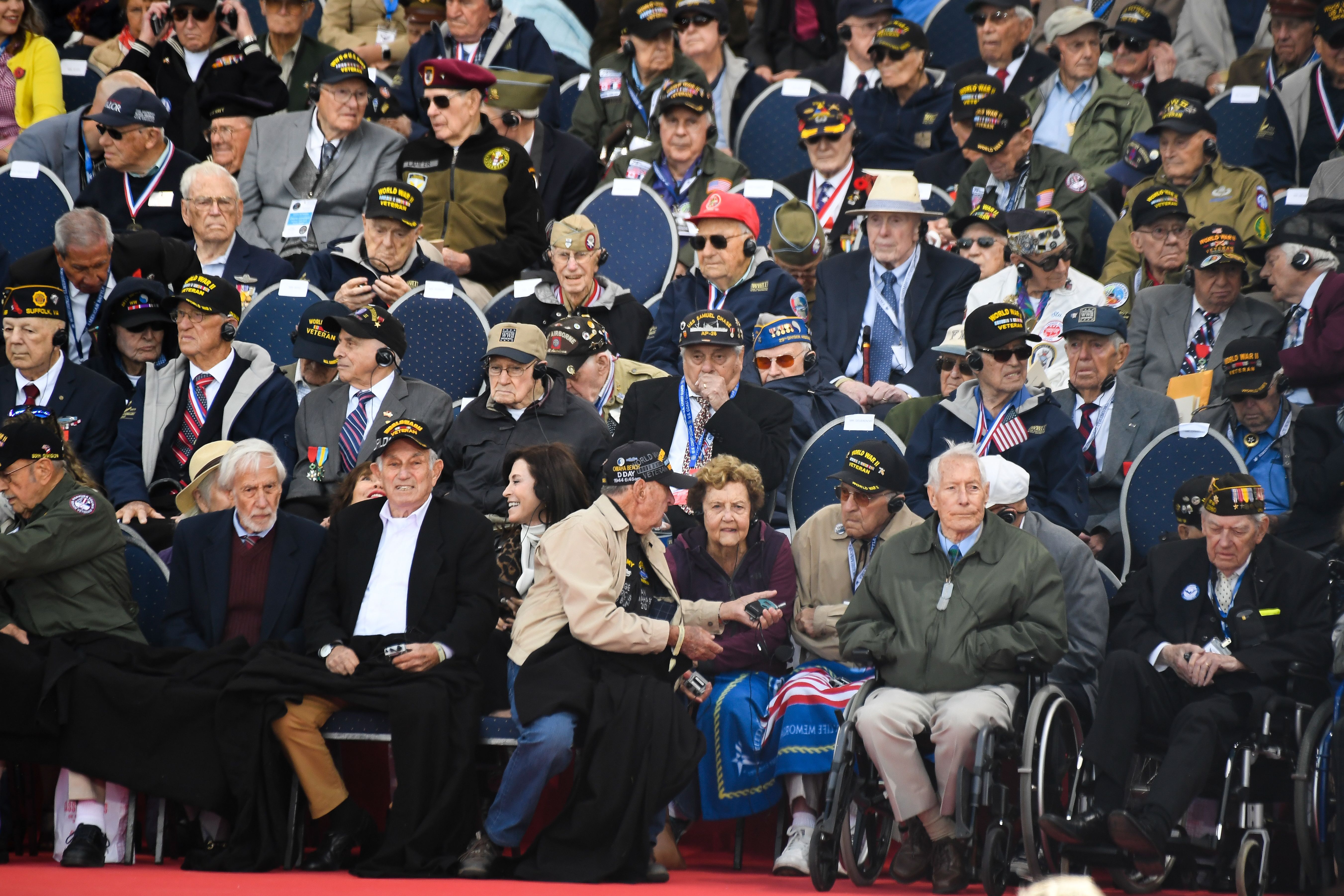 US army veterans and guests attend a French-US ceremony at the Normandy American Cemetery.