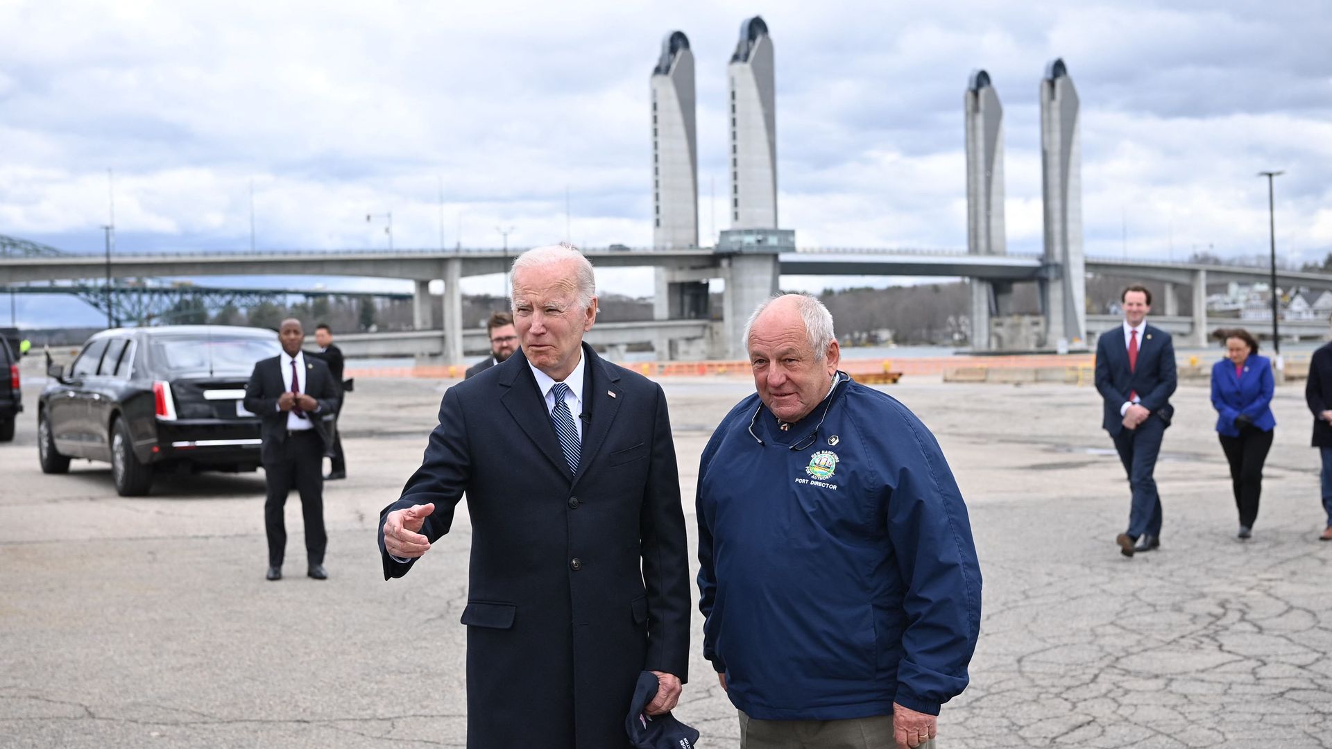President Biden is seen addressing reporters amid a tour of the port in Portsmouth, N.H.
