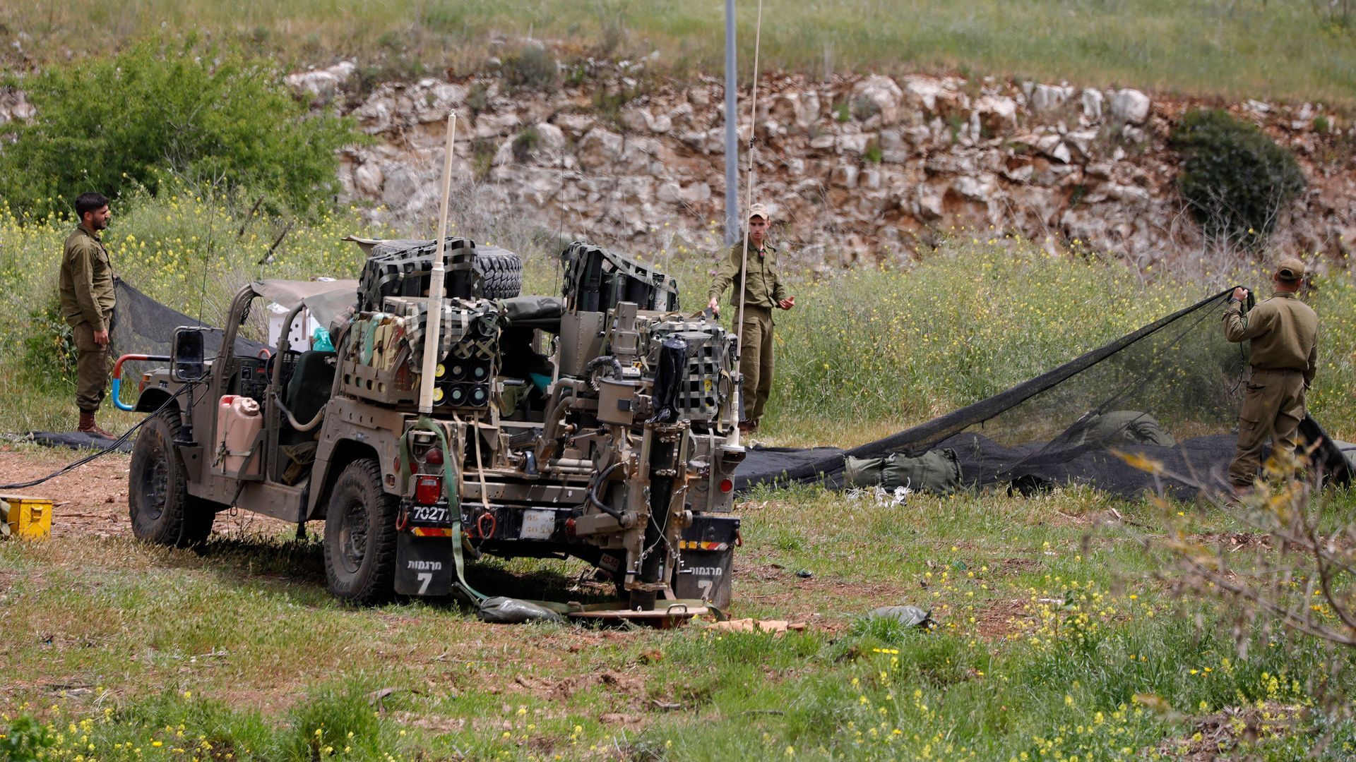 Israeli soldiers deploy in an open area near the border with Lebanon. Photo: Jalaa Marey/AFP via Getty Images
