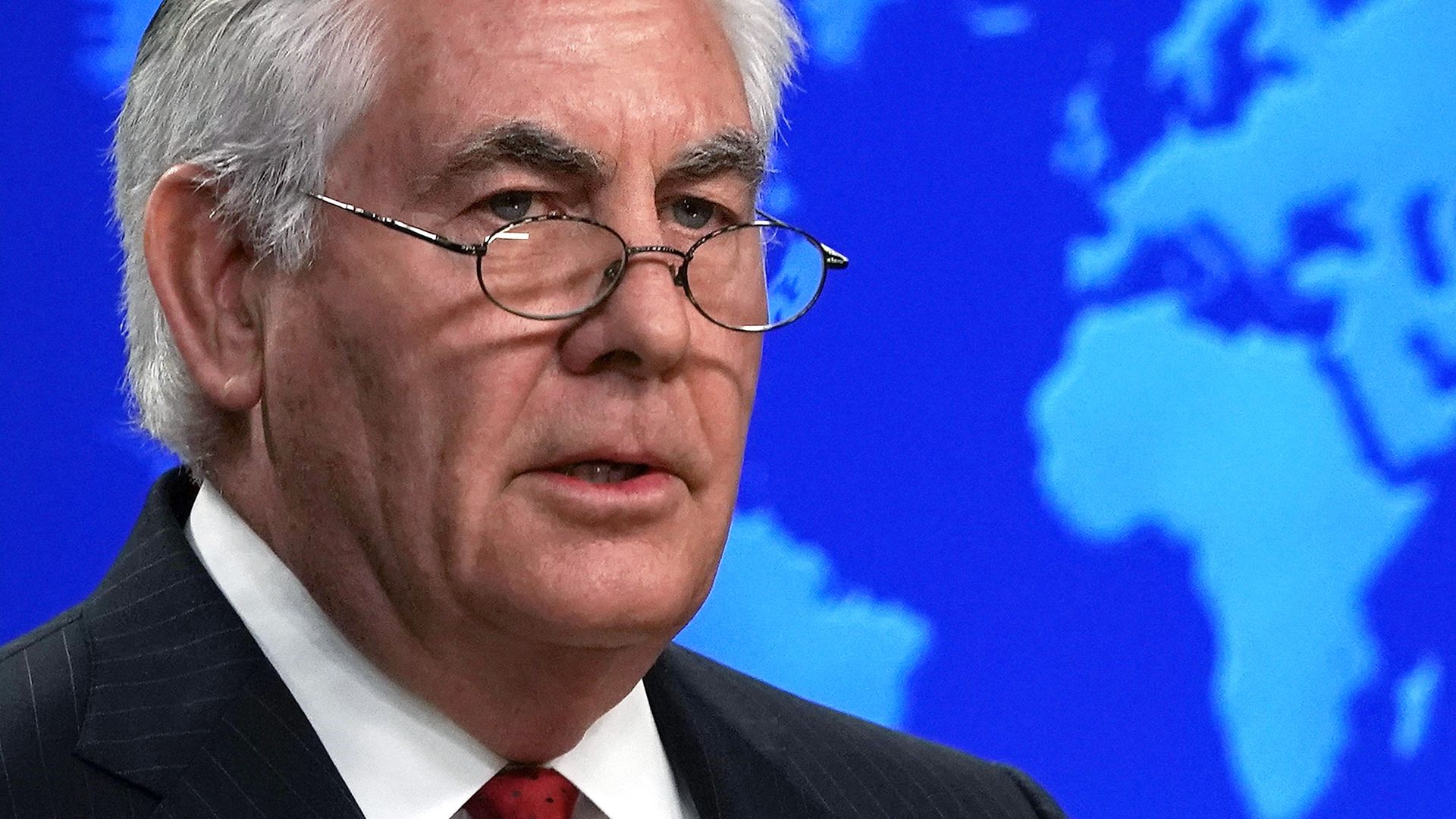 Former Secretary of State Rex Tillerson in a suit and tie. 
