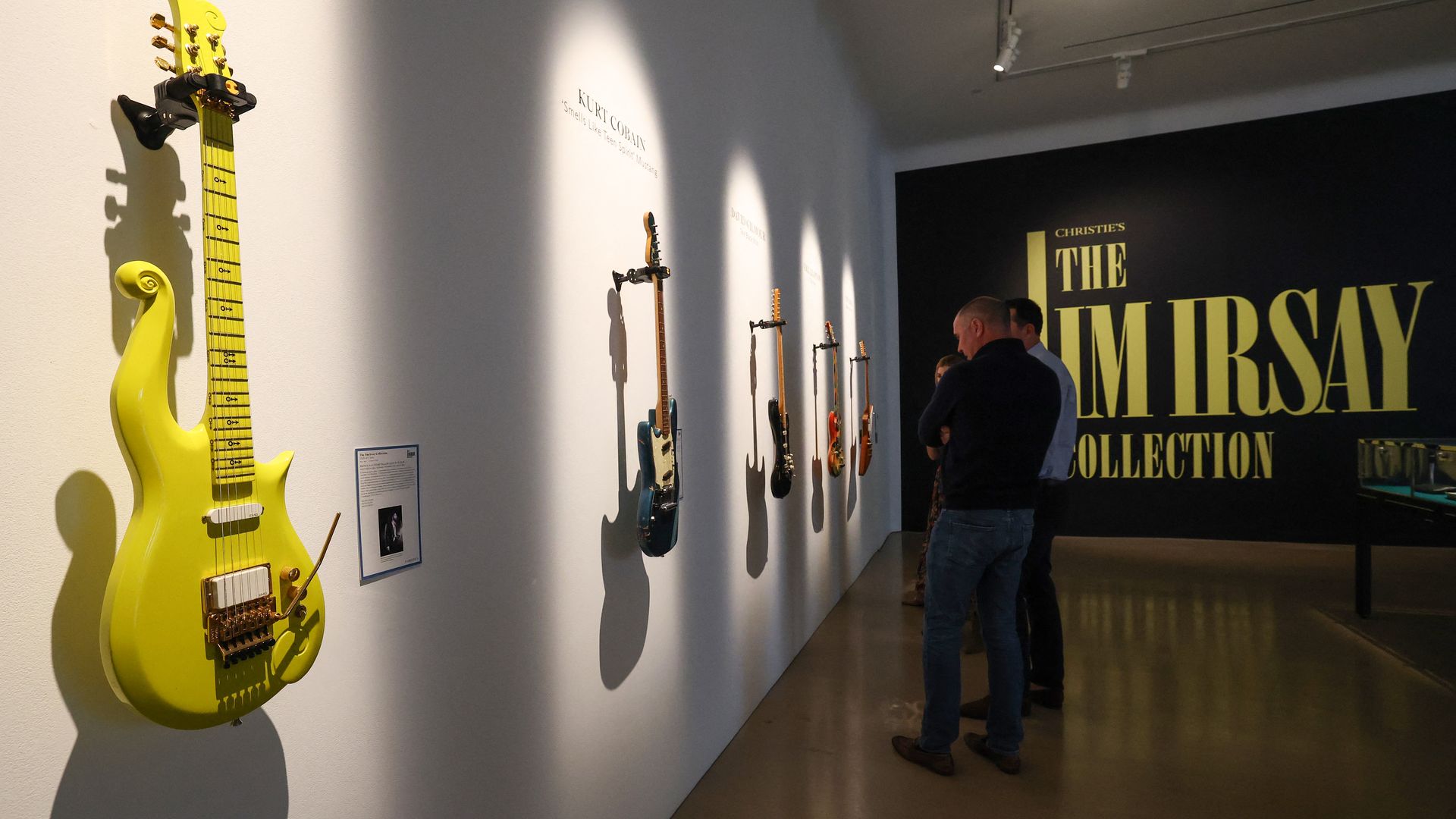 Prince's Andy Beech custom Yellow Cloud guitar (L) is displayed as visitors look at items during a press preview of The Jim Irsay Collection at Christie's Los Angeles in Beverly Hills, California, on February 5, 2026.