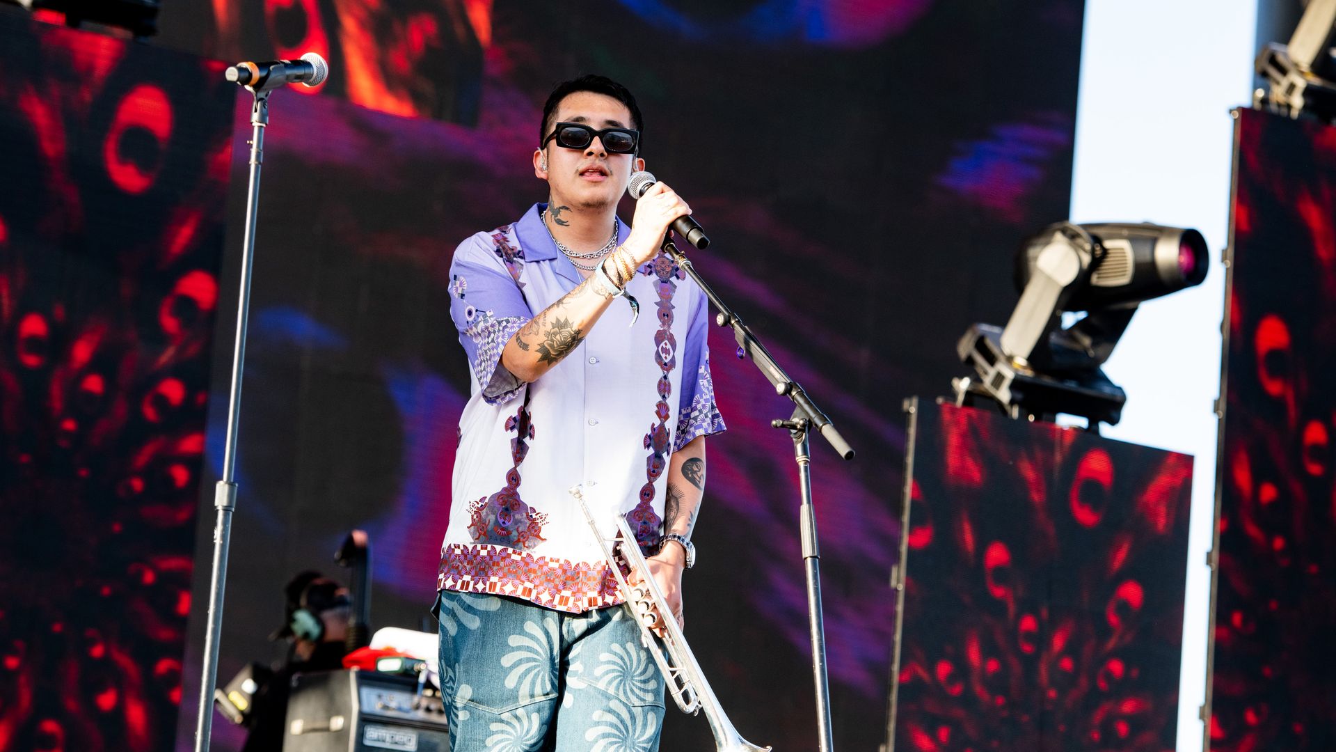 A man performing on stage.