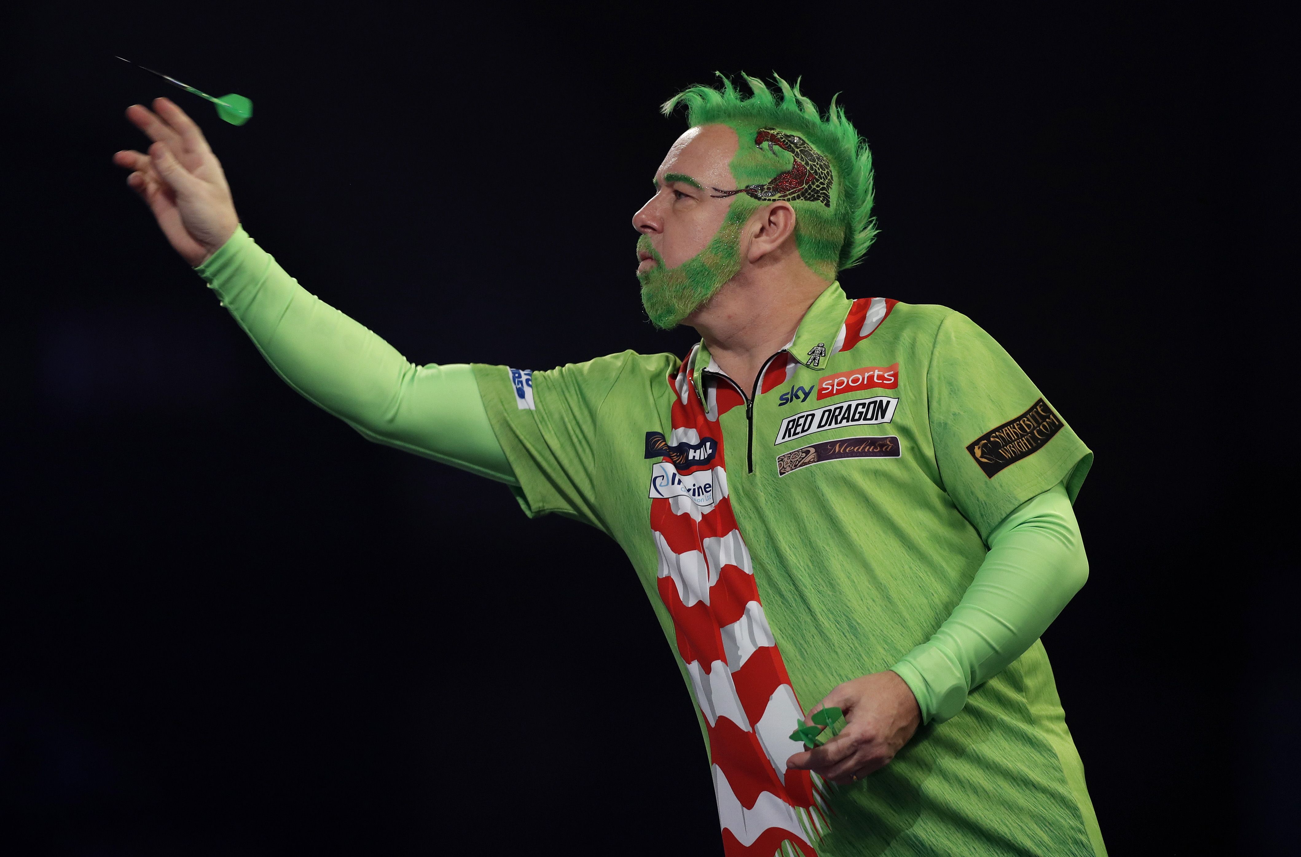 Guy throwing a dart