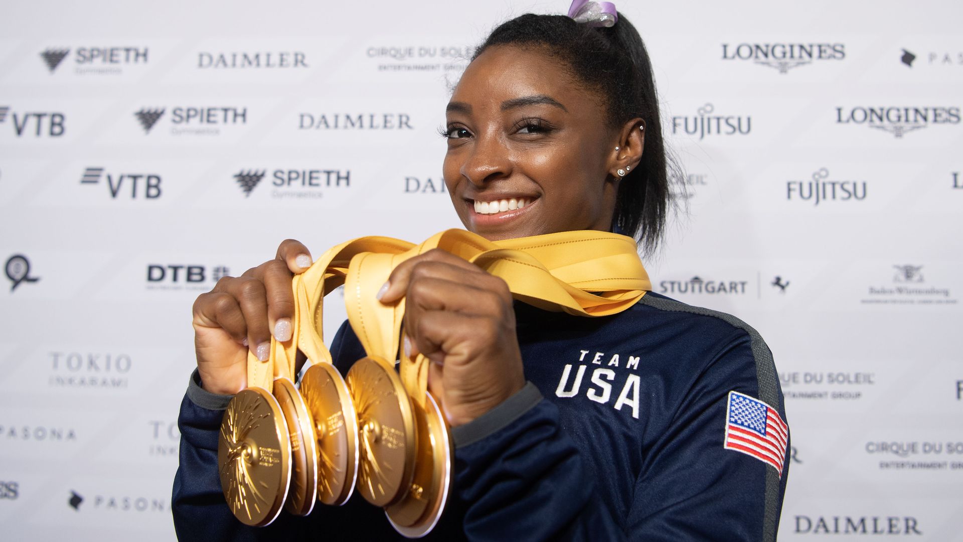 Gymnast Simone Biles holds five gold medals from the 2019 World Championships.