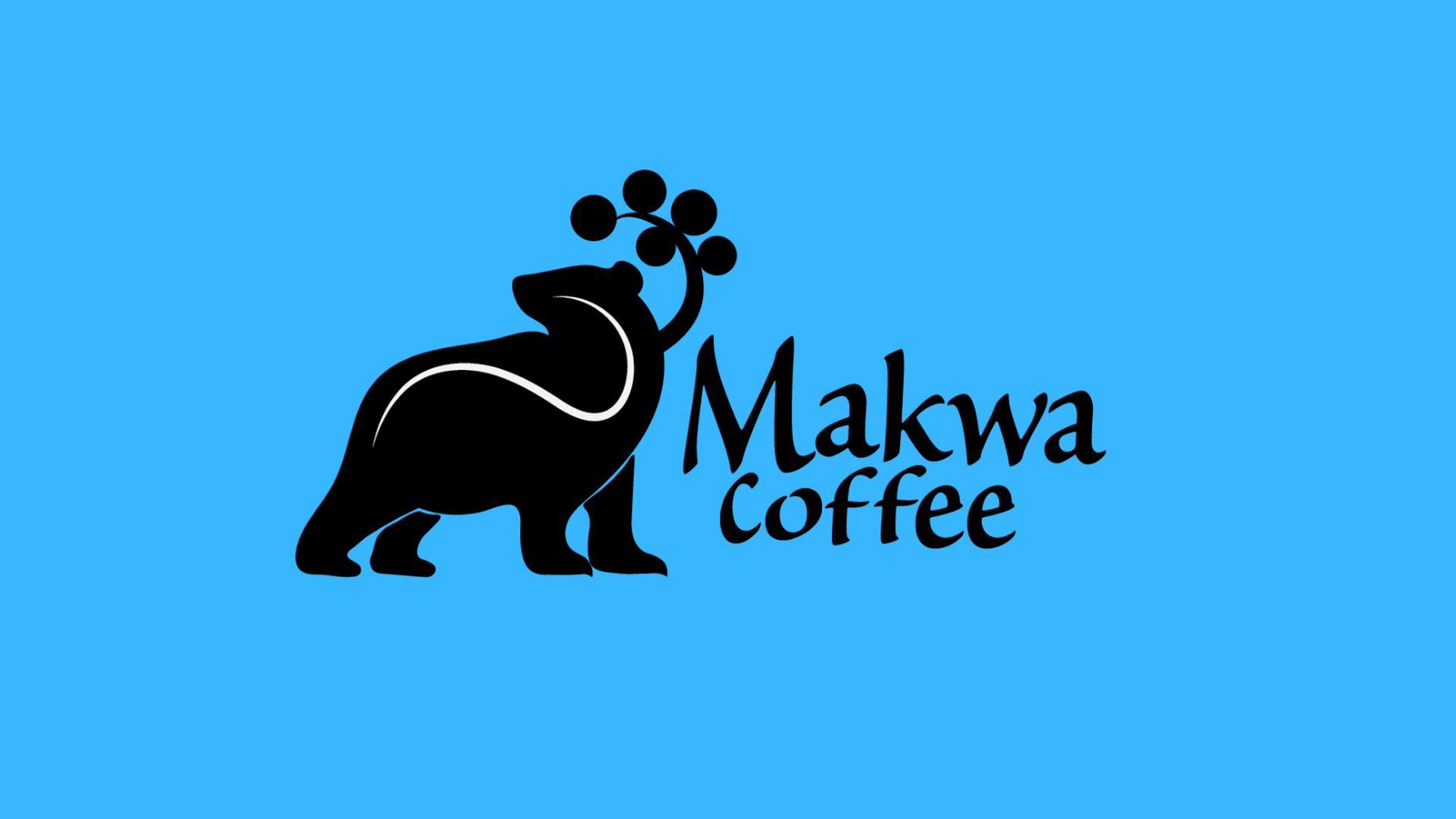 A drawing of a black bear on a blue background with the words Makwa Coffee.