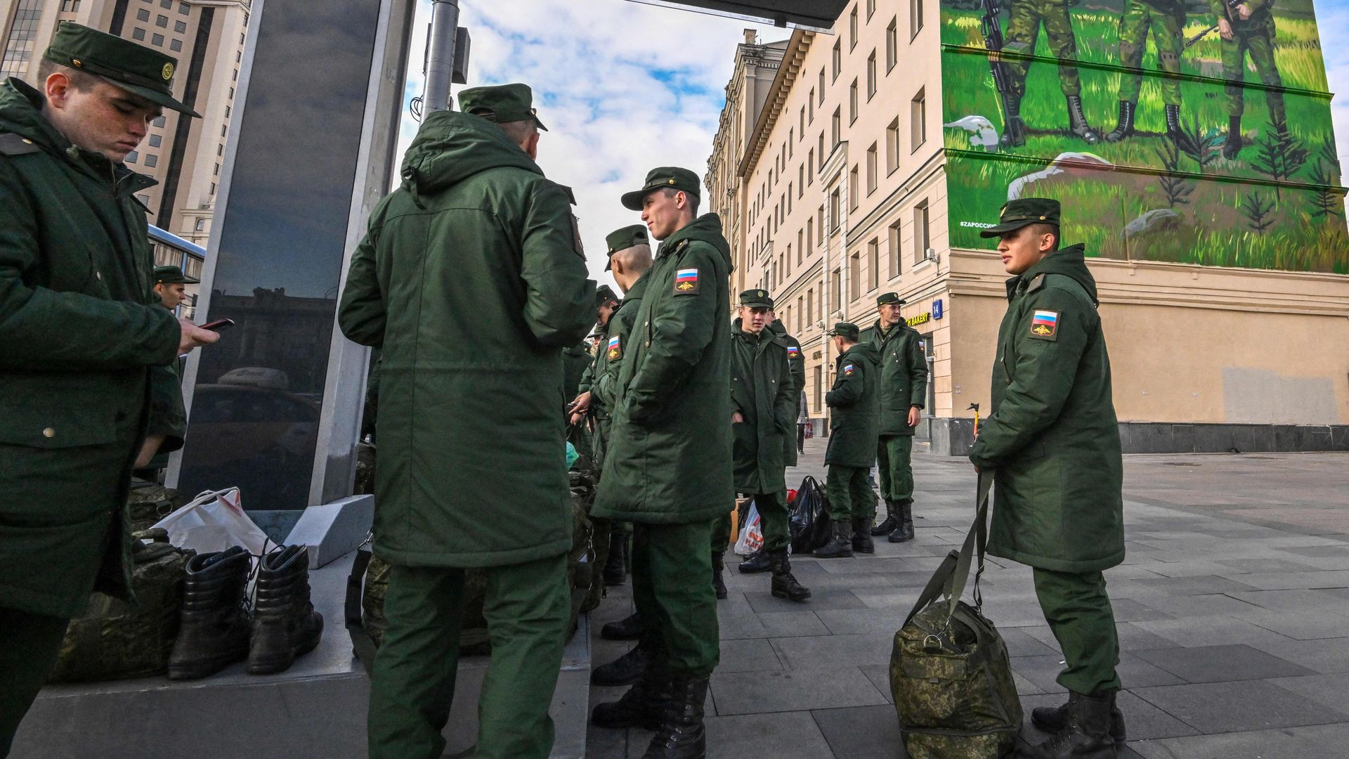 Russian soldiers wait for their departure 