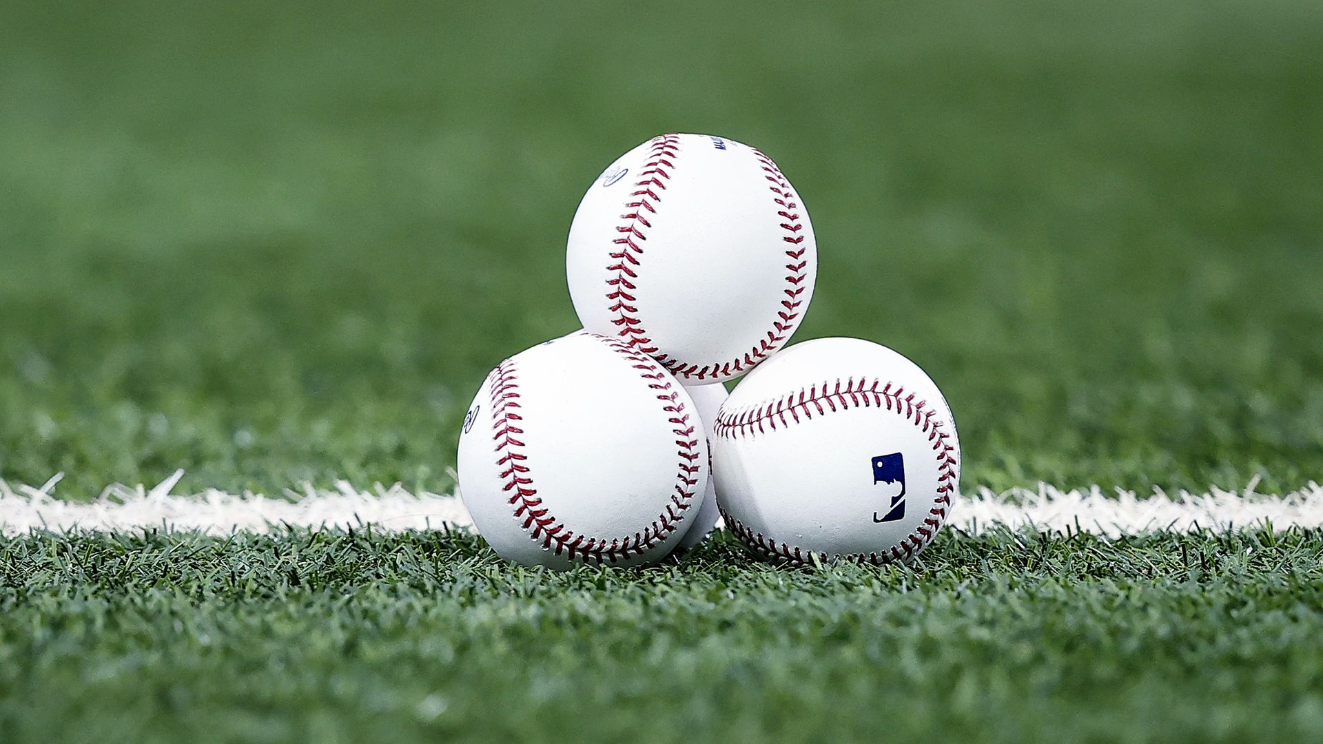 Baseballs on turf