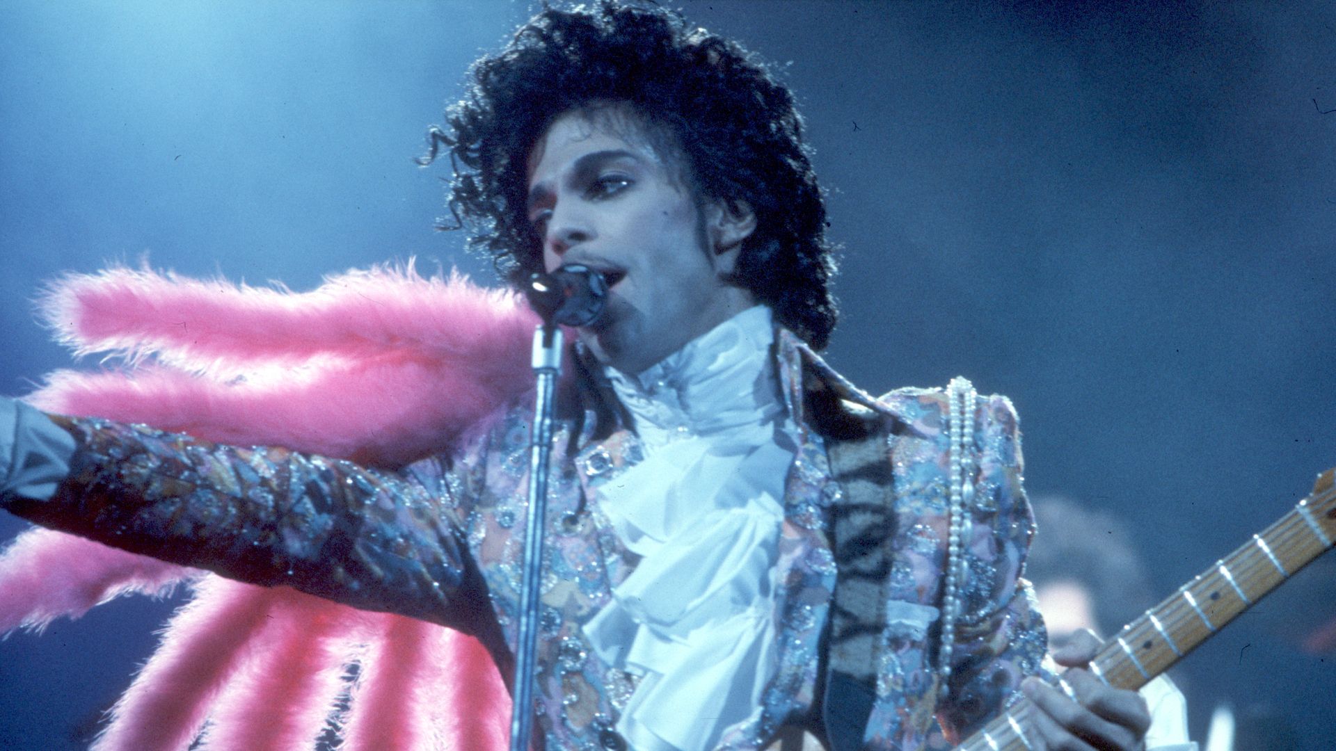The musician Prince performing on stage.