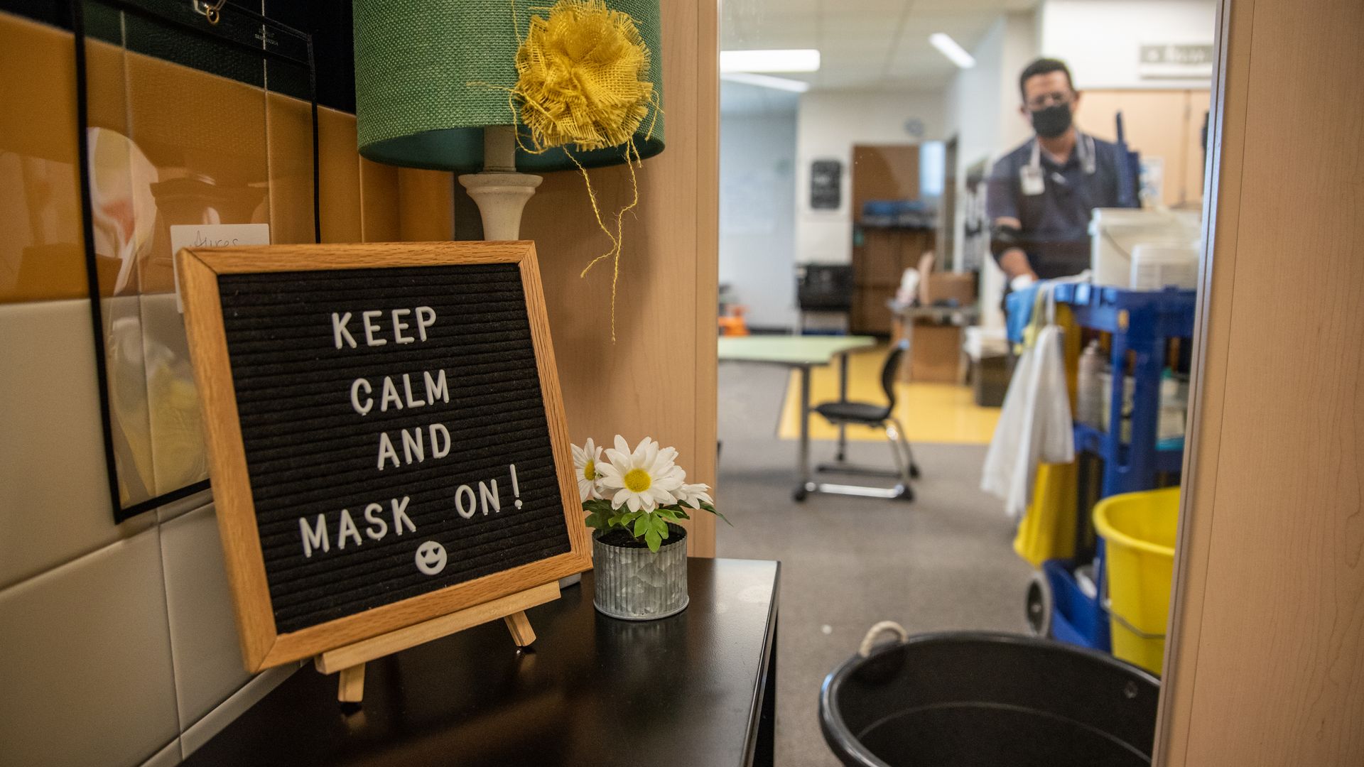 A sign outside a classroom reminds students to wear masks at an elementary school in Leander, Texas, U.S., on Friday, Sept. 18, 2020.