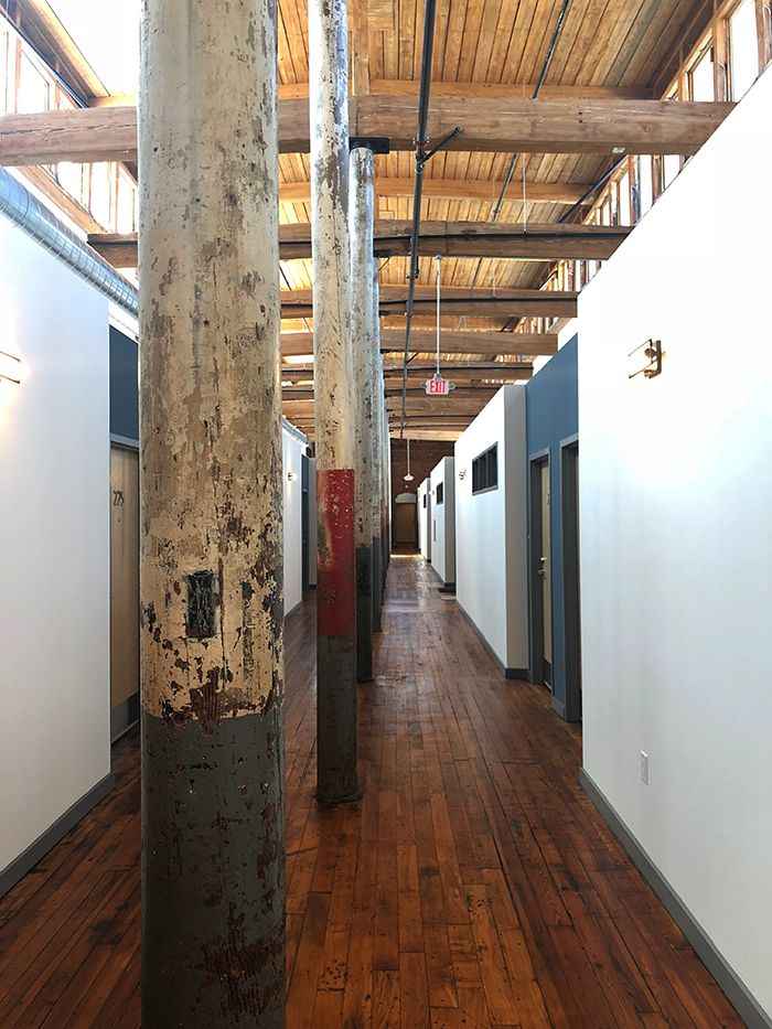 Lofts at Hawthorne Mill hallways original structure