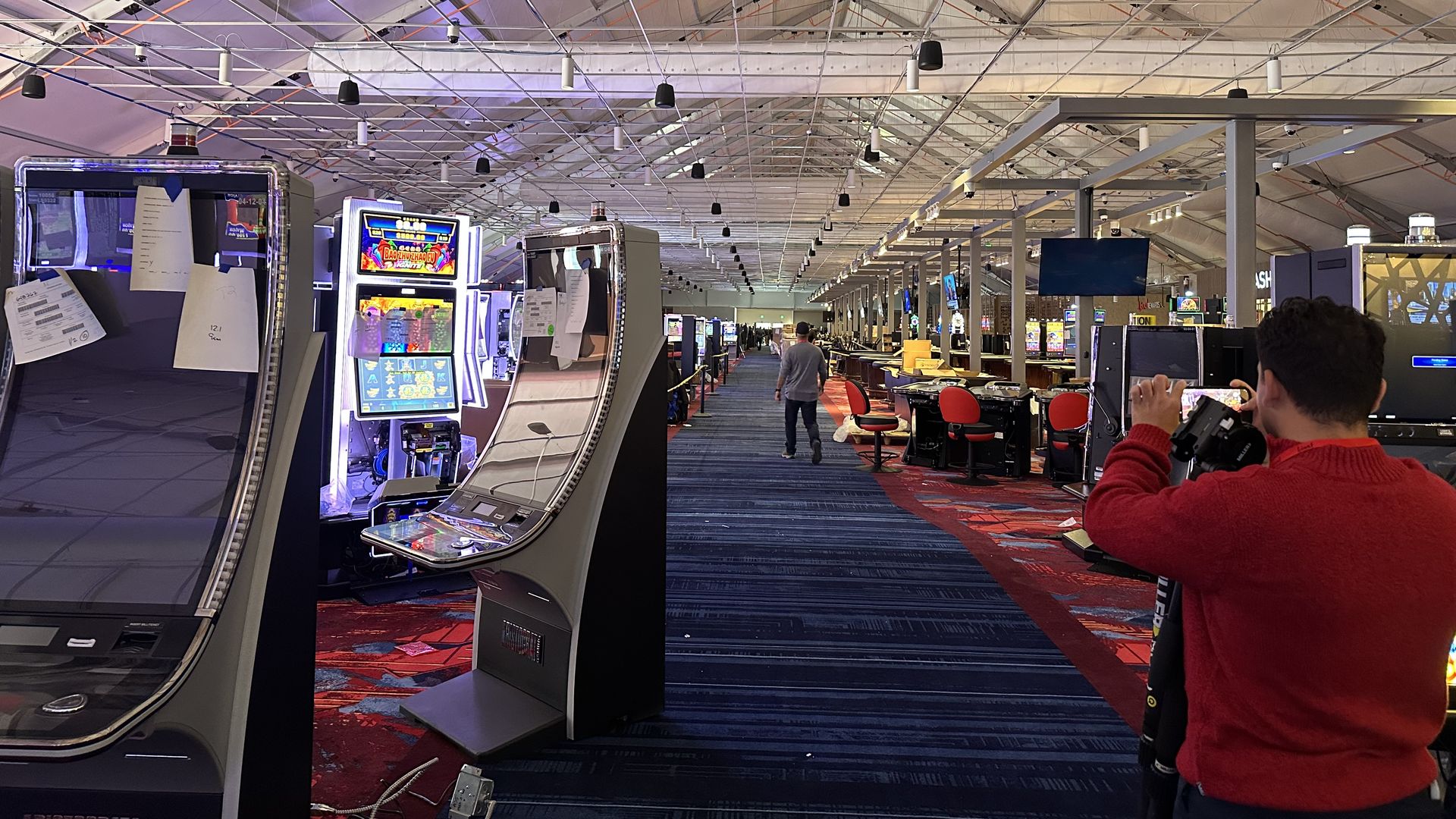 a look down the whole hall of a tent casino 