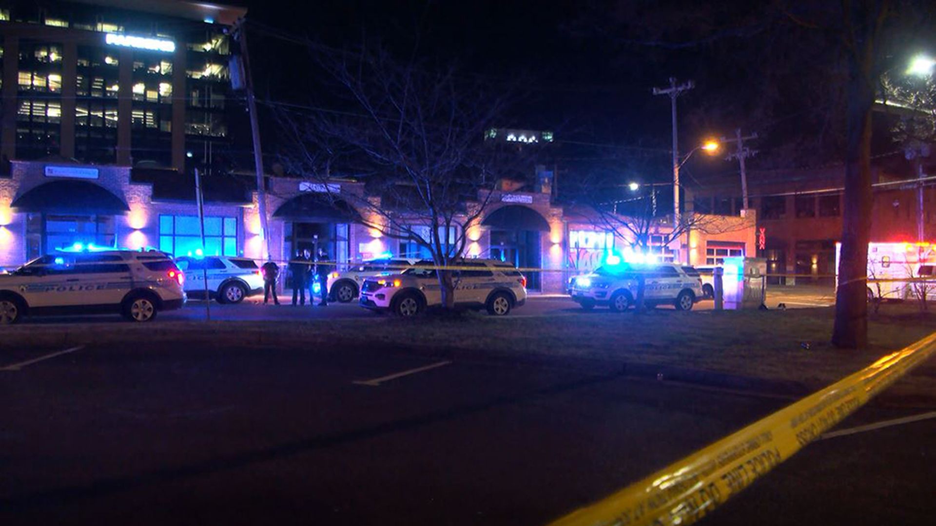 Police tape blocks off a street in South End after a deadly shooting.