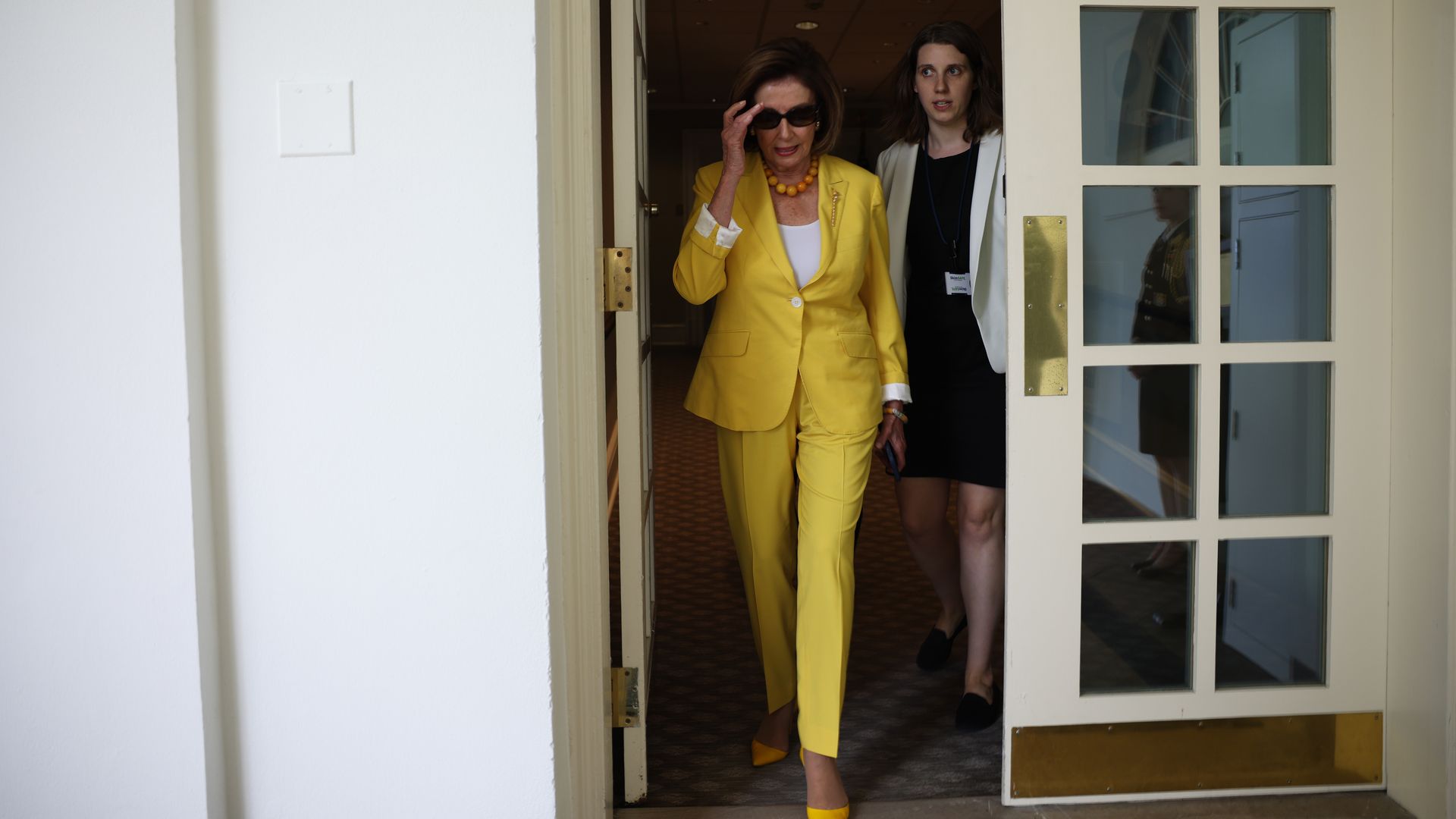 House Speaker Nancy Pelosi is seen entering the Rose Garden.