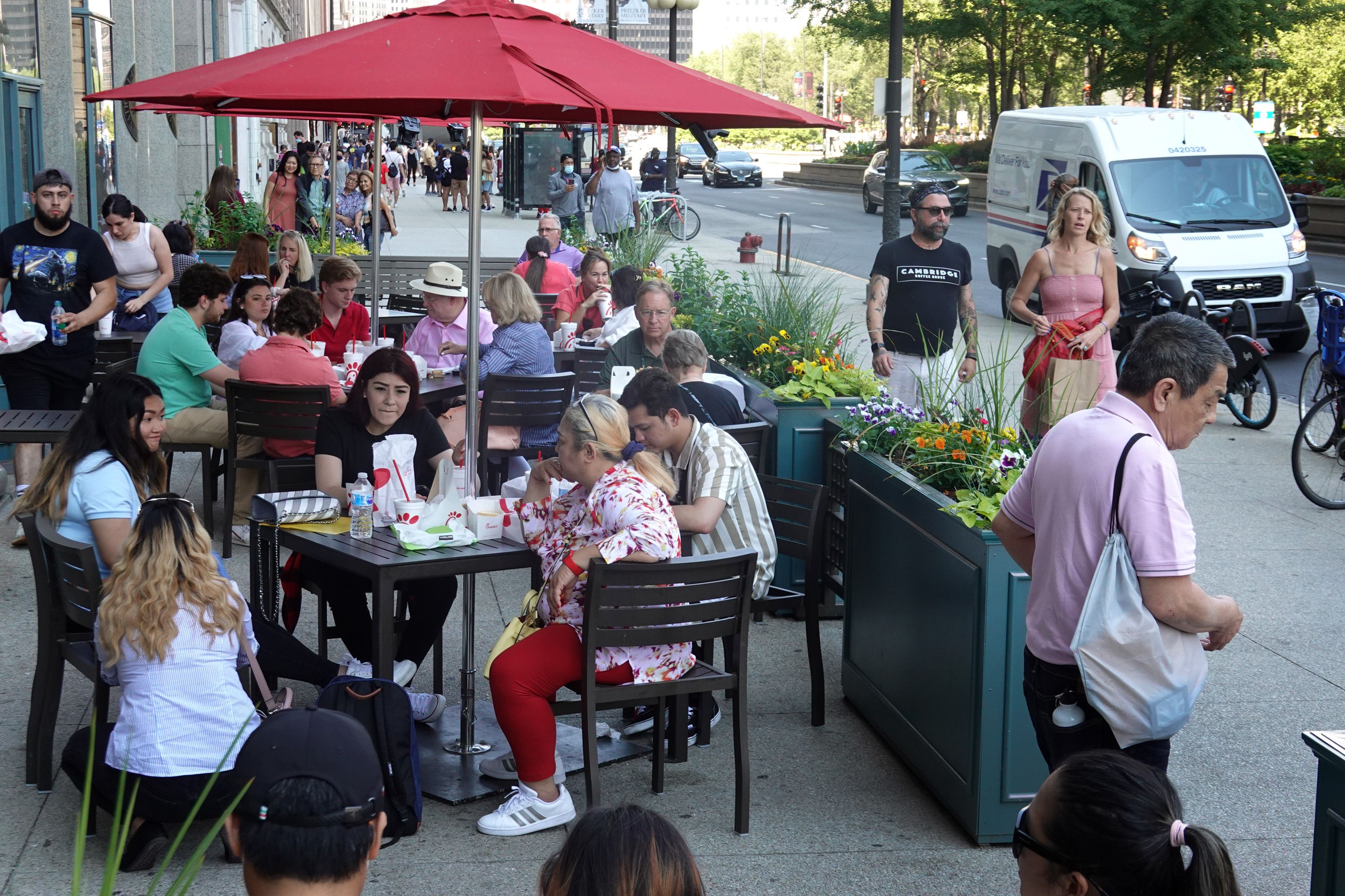 People gather for lunch at a restaurant on Michigan Avenue on June 11, 2021 in Chicago, Illinois. 