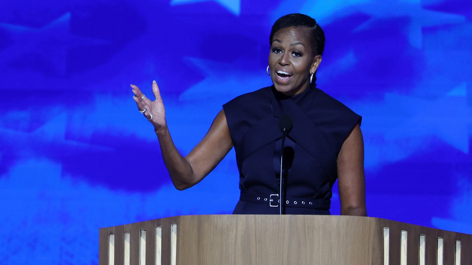  Former First Lady Michelle Obama speaks during Day 2 of the 2024 Democratic National Convention at the United Center in Chicago, Illinois on August 20, 2024. 