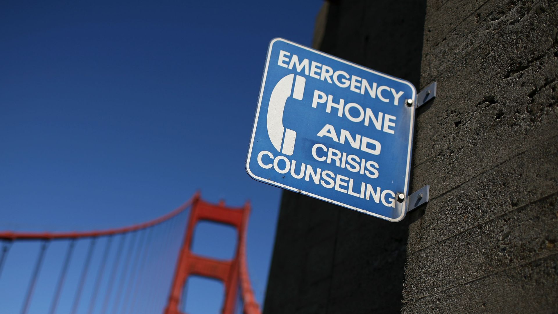  A sign for an emergency phone is seen on a span of the Golden Gate Bridge.