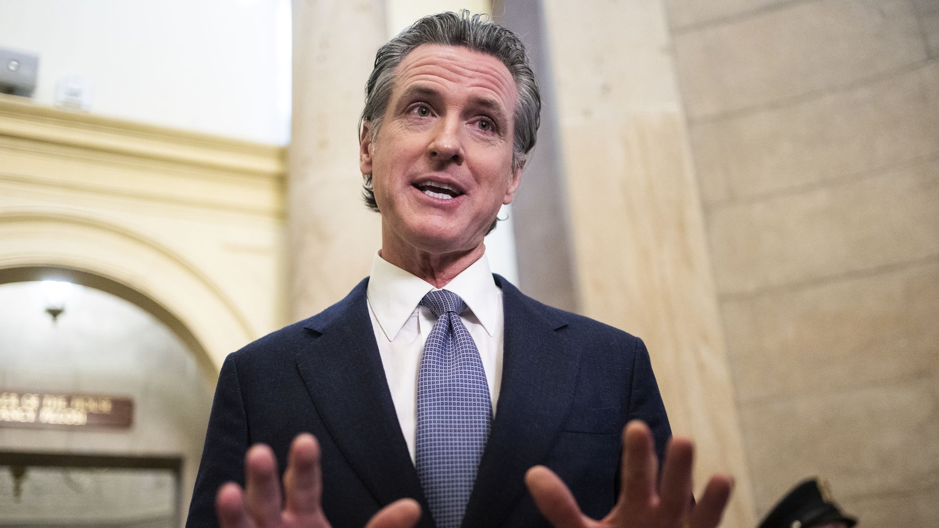 California Gov. Gavin Newsom (D) talks with reporters after a meeting with Speaker of the House Nancy Pelosi, D-Calif.