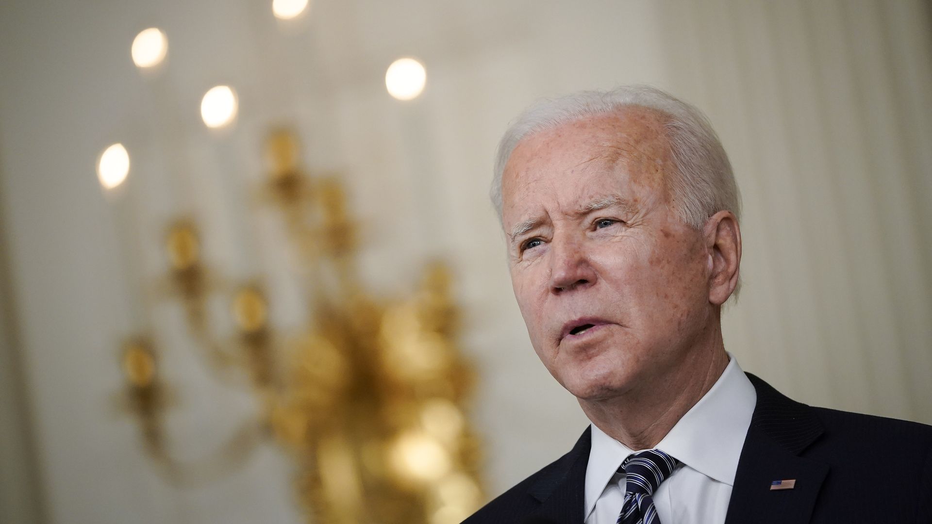 President Joe Biden delivers remarks in the State Dining Room of the White House on March 15