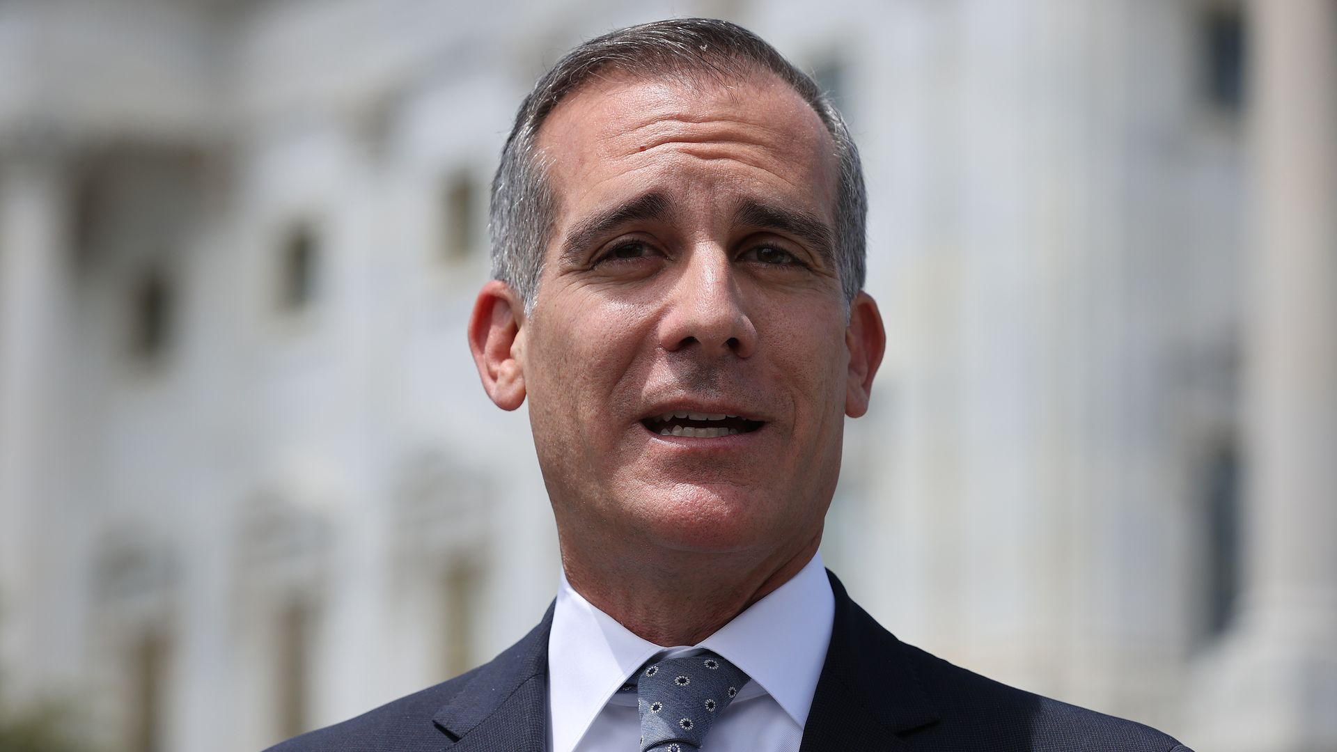 Los Angeles Mayor Eric Garcetti is seen speaking in front of the U.S. Capitol.