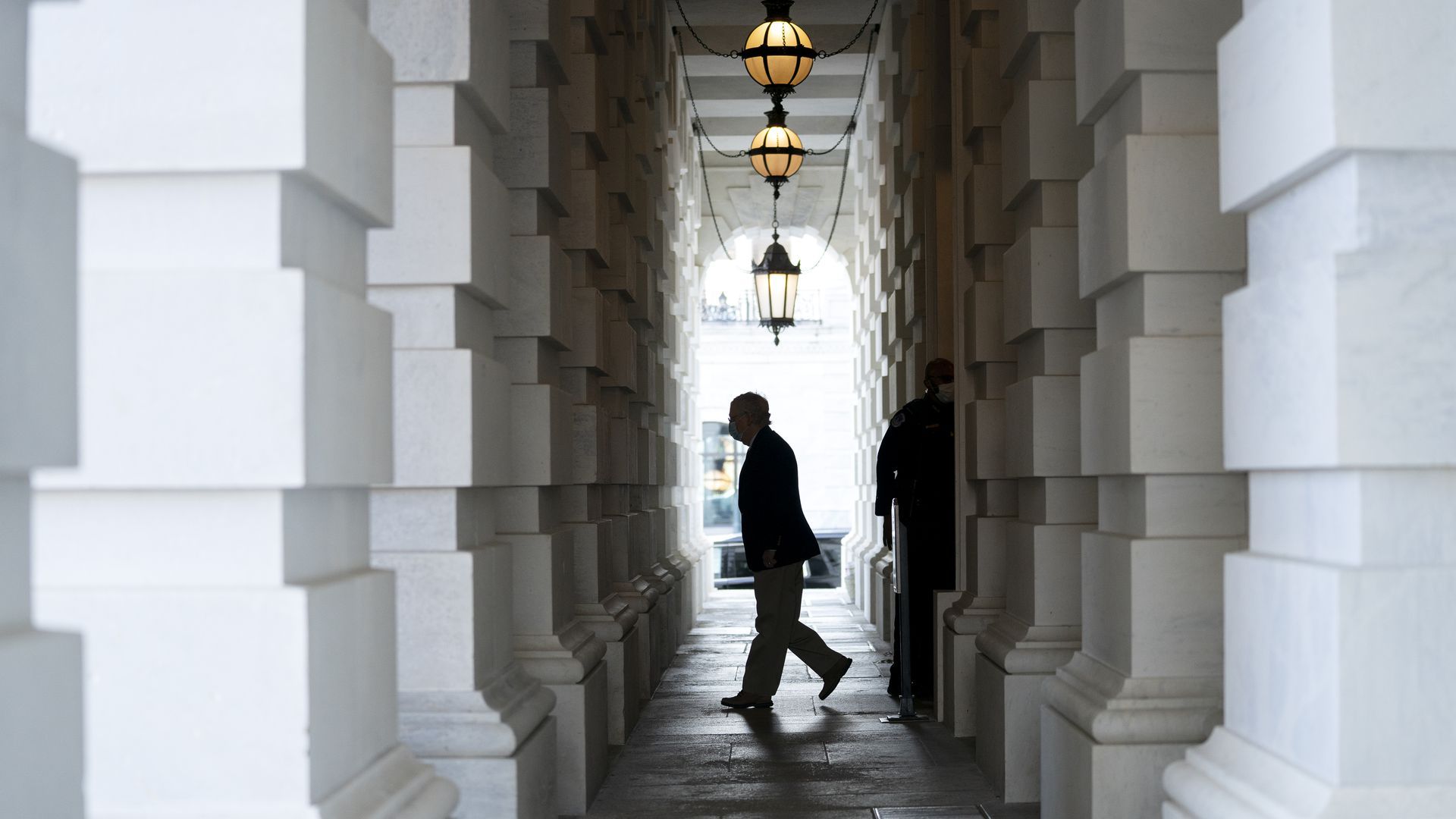 Senate Majority Leader Mitch McConnell departs the Capitol on Dec. 11. Photo: Stefani Reynolds/Getty Images