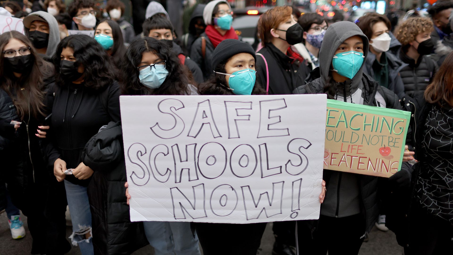 Public school students protest outside of the Chicago Public Schools headquarters after walking out of their classrooms on January 14, 2022 in Chicago, Illinois. 