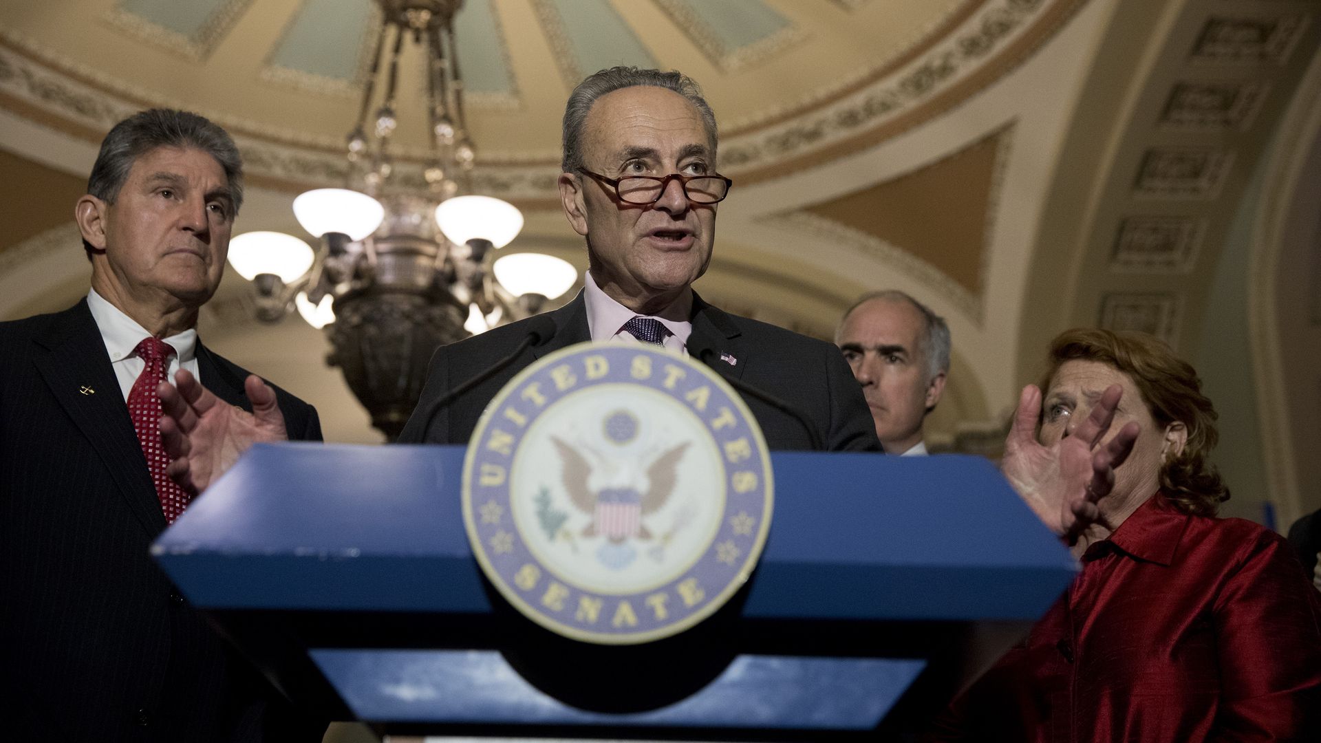 Sen. Joe Manchin is seen with Senate Majority Leader Chuck Schumer.