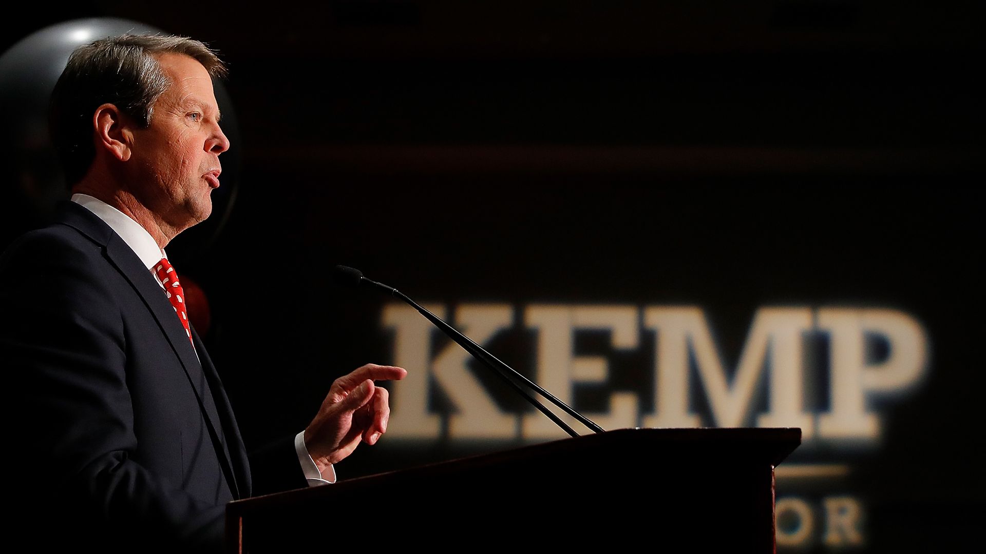 Georgia Governor Brian Kemp speaks at a rally.