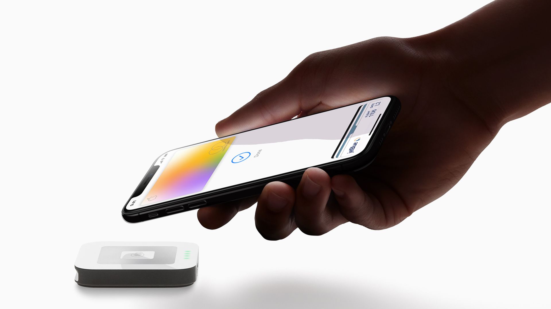 An iPhone owner using Apple Card to make a payment.