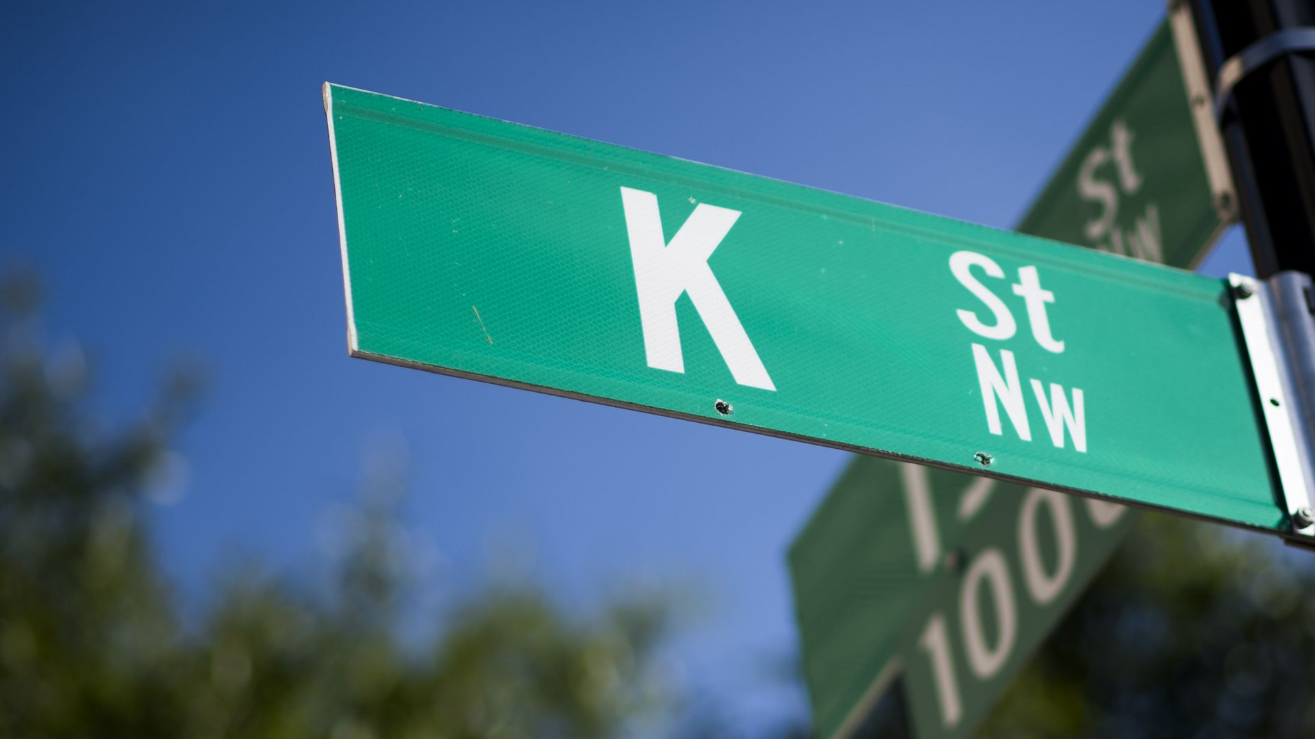 K street sign, in a reference to the lobbying hub in D.C.
