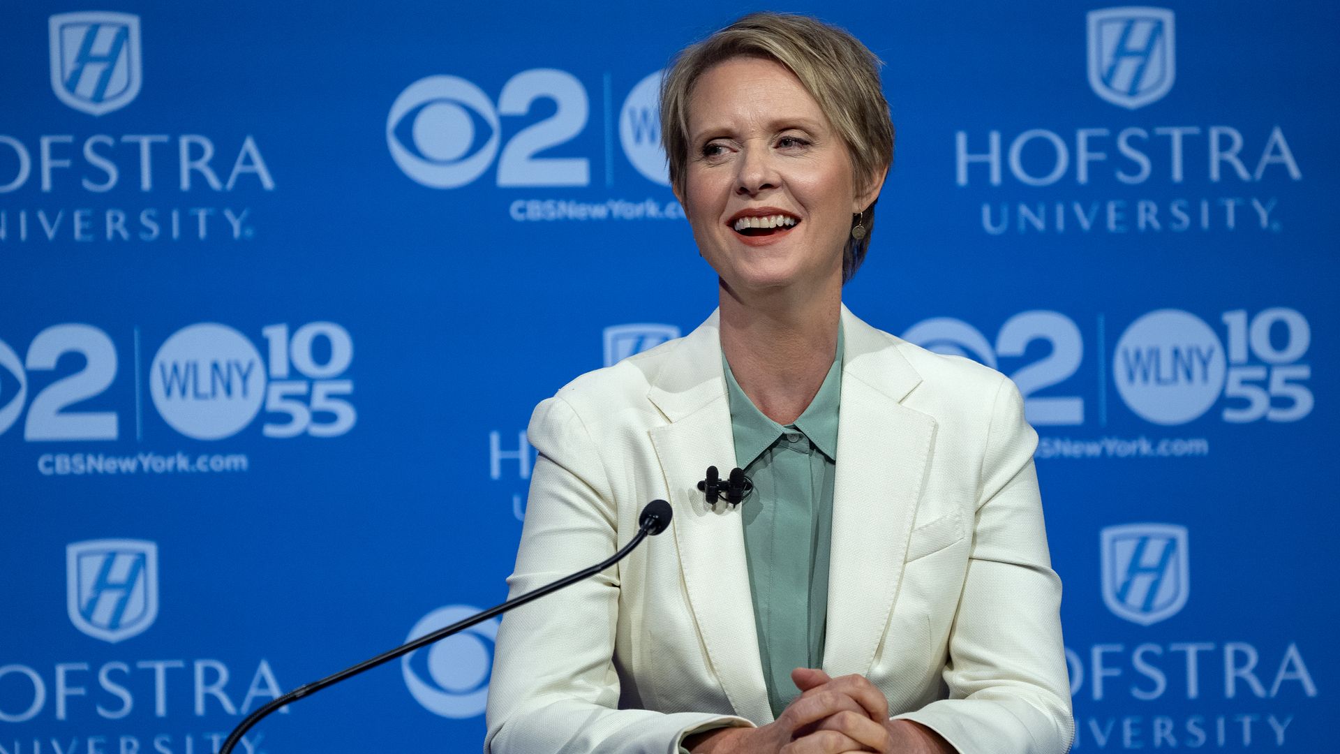 Cynthia Nixon laughs during a debate against Governor Andrew Cuomo