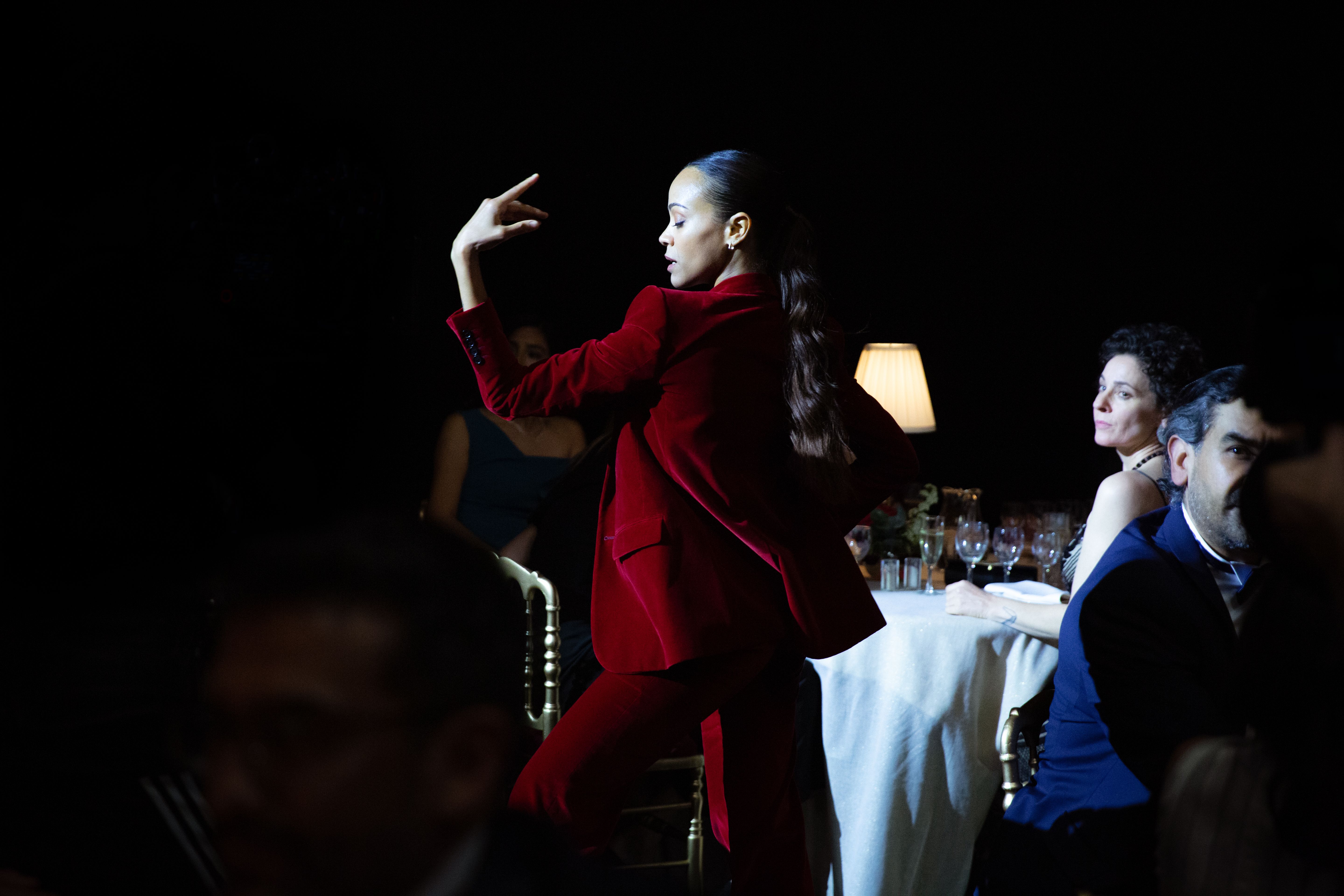 Zoe Saldana dances in a scene from the movie "Emilia Pérez."