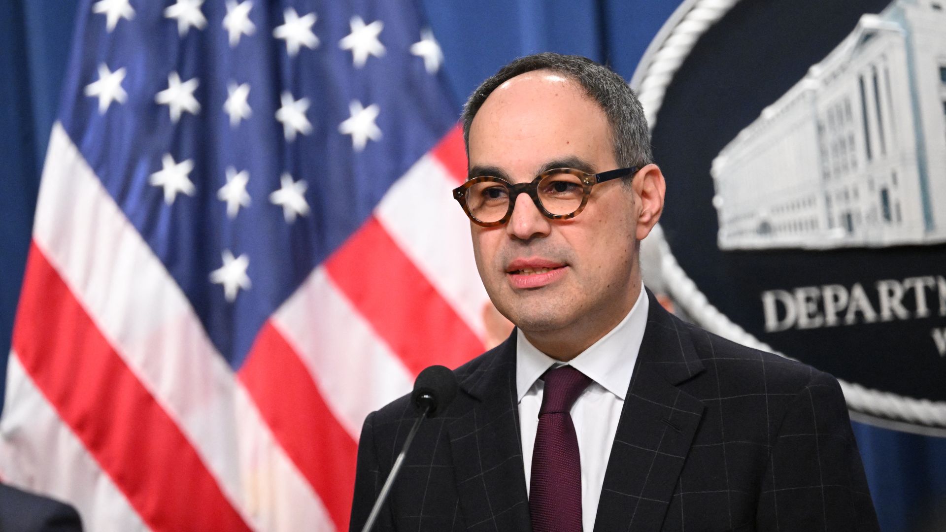 Jonathan Kanter speaks during a press conference