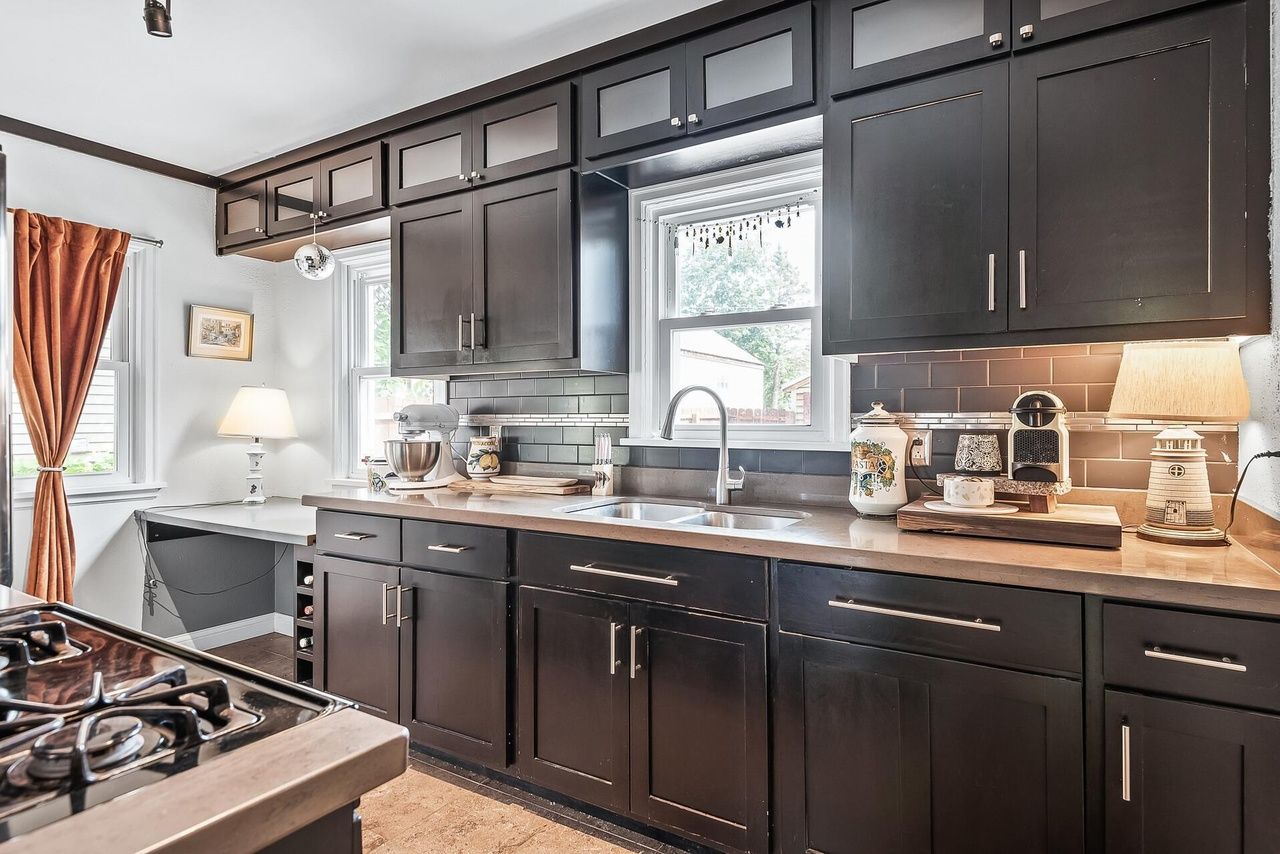 kitchen with dark cabinetry