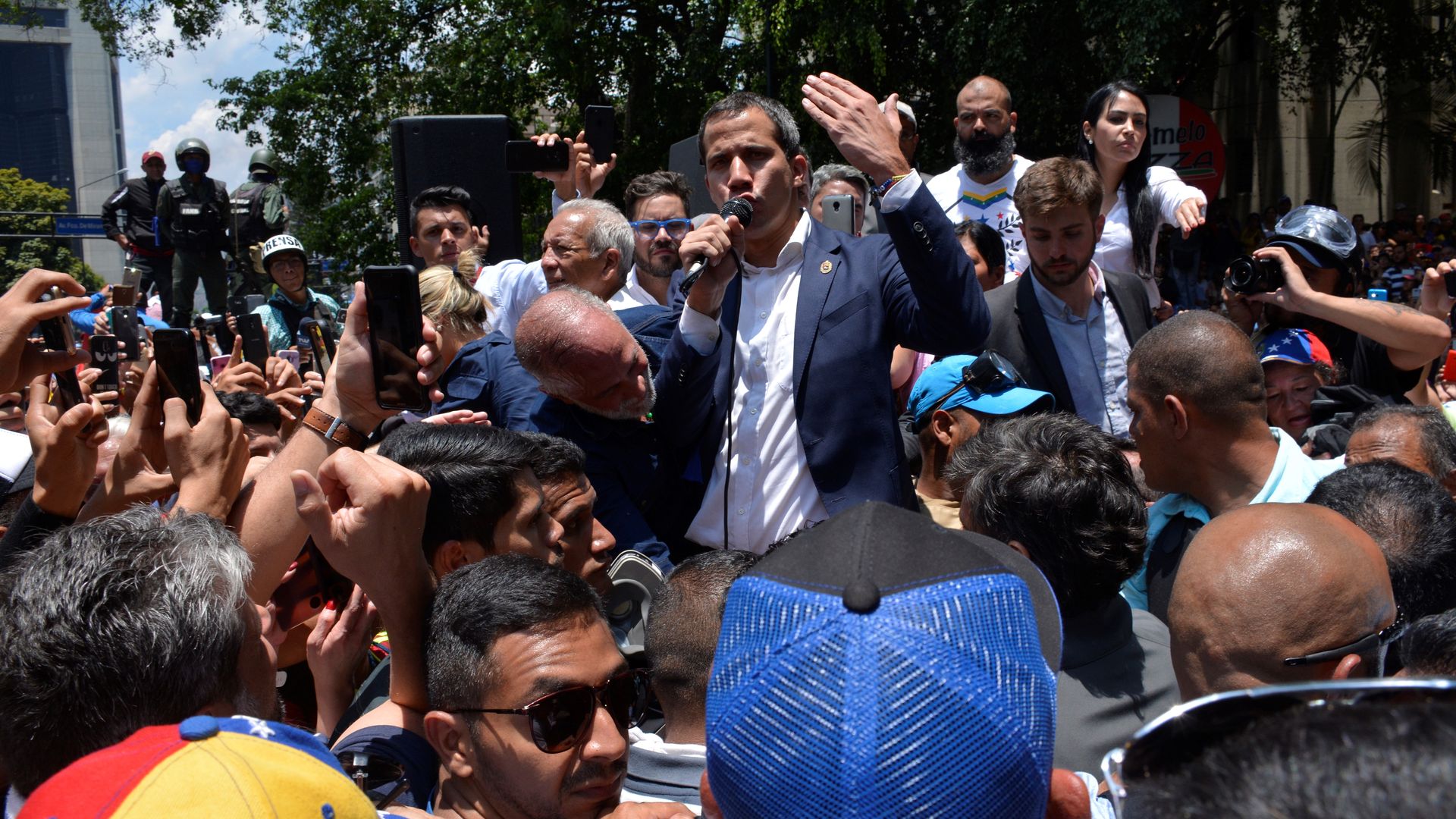 Juan Guaido addressing his supporters in the street