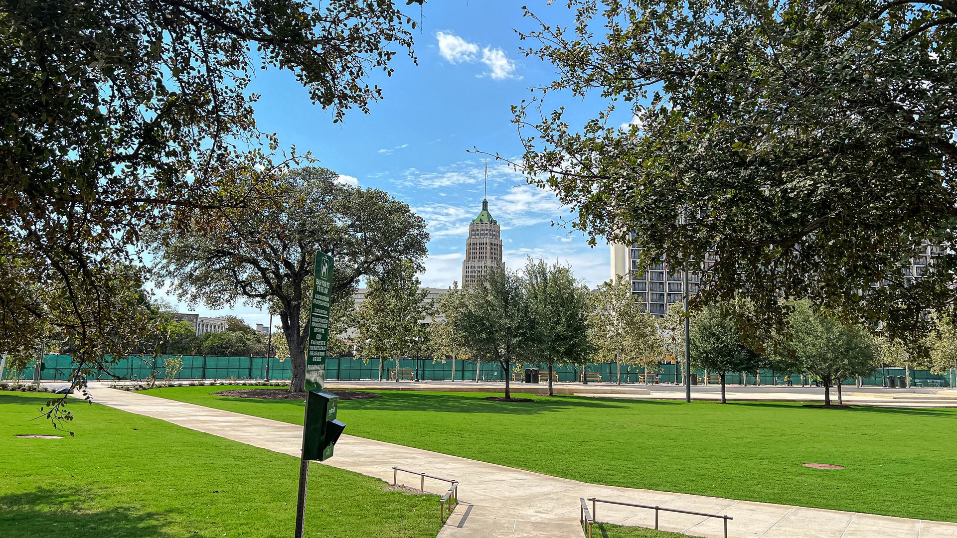 The Tower Life building is seen across from the great lawn at Civic Park.