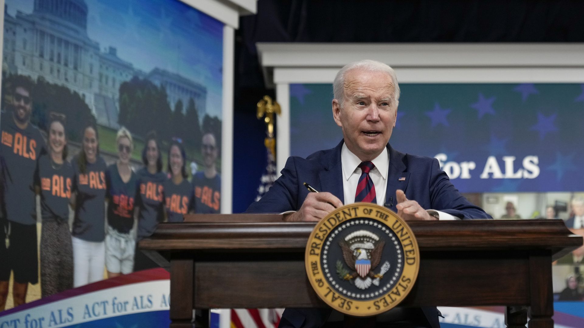President Joe Biden signs H.R. 3537, the Accelerating Access to Critical Therapies for ALS Act in the South Court Auditorium of the White House complex December 23, 2021 in Washington, DC.