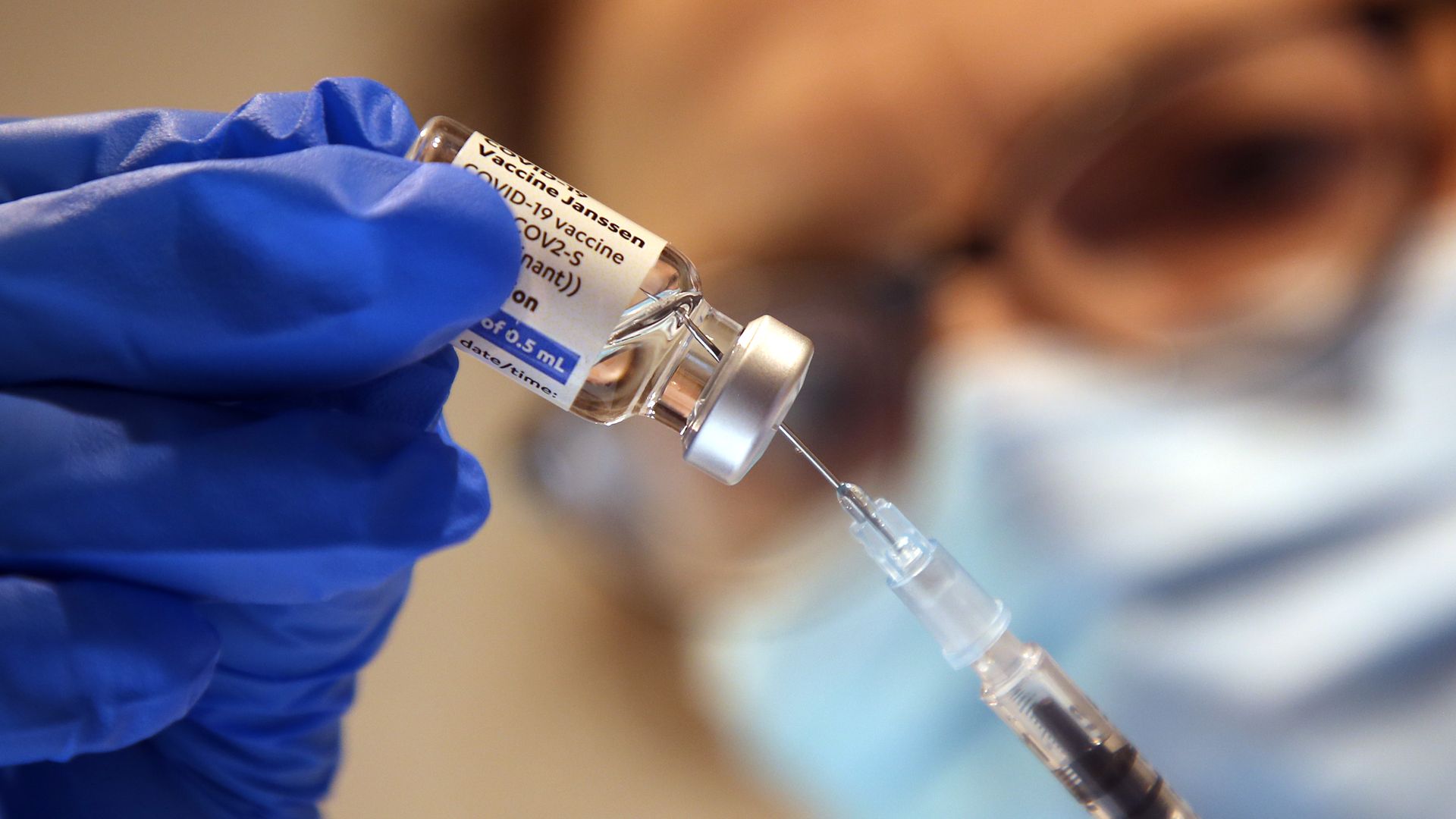 A health care worker preparing a shot of Johnson & Johnson's coronavirus vaccine in Berlin in September 2021.