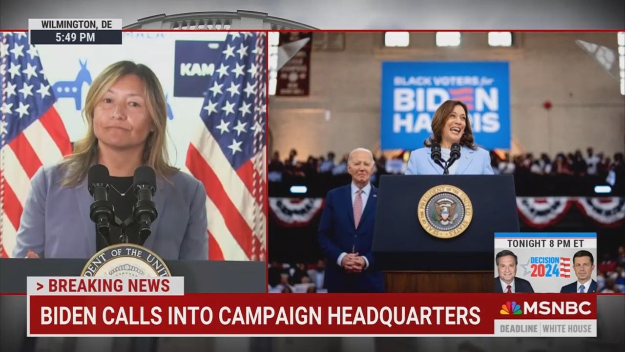 Campaign manager Julie Chavez Rodriguez watches as Biden calls into what is now the Harris campaign headquarters in Wilmington, Del.