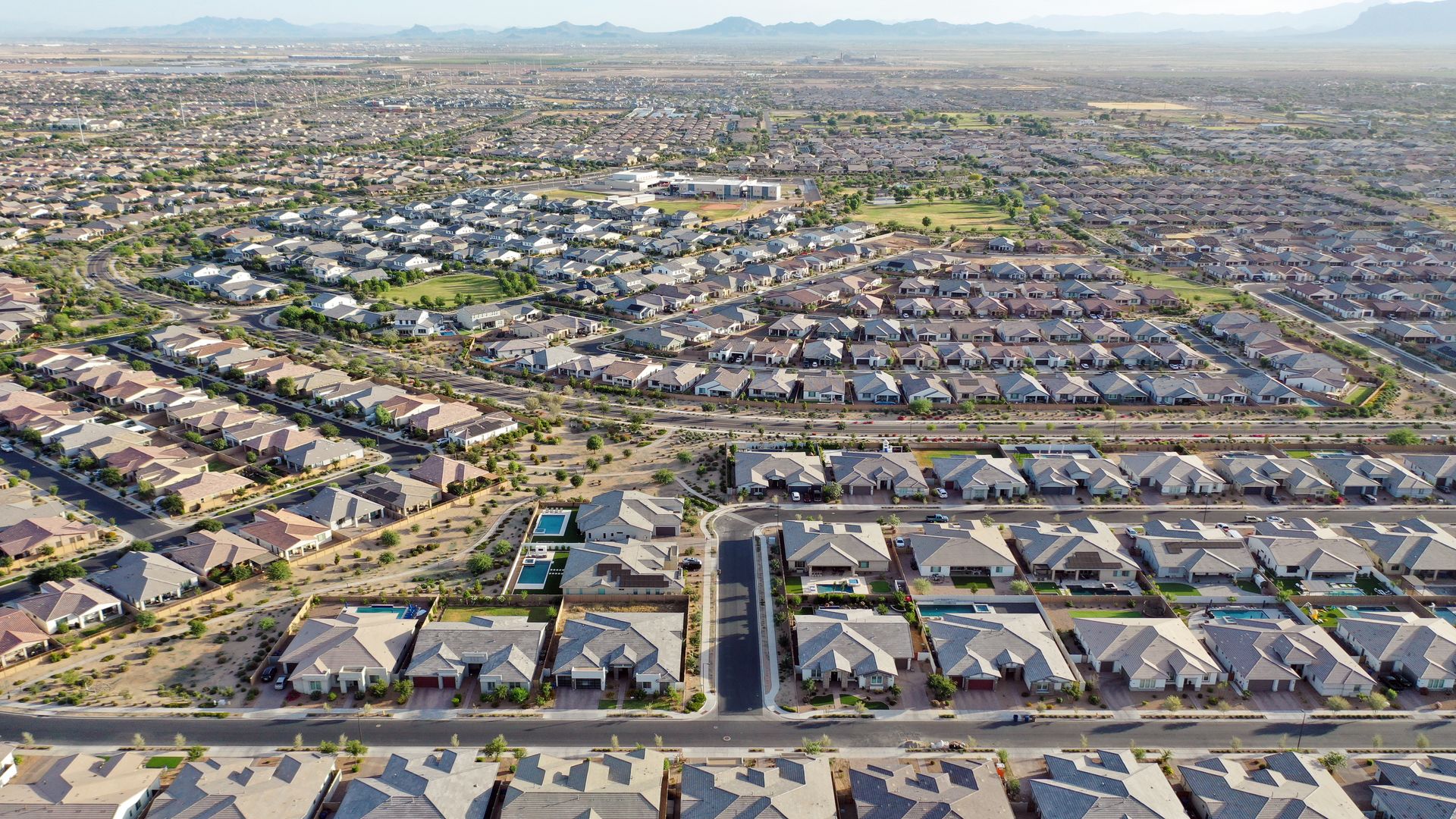 An aerial view of a suburban neighborhood. 