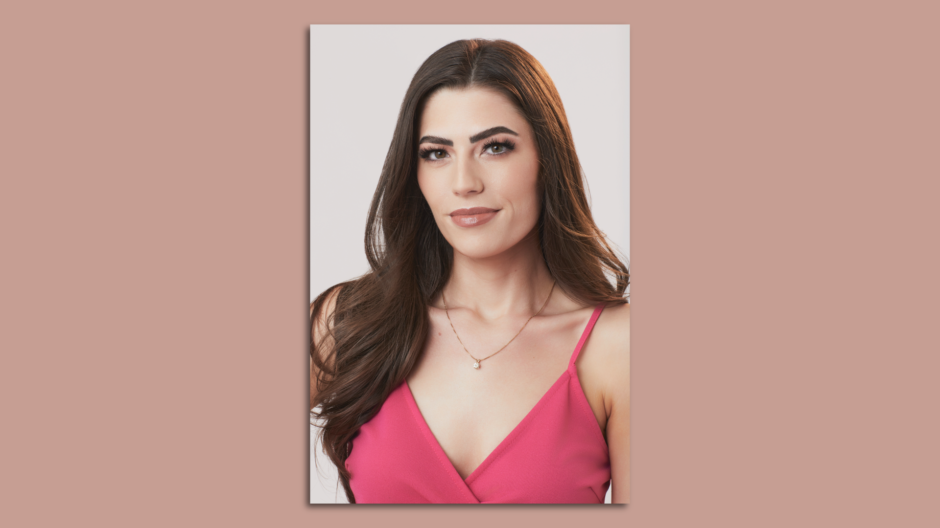 A very beautiful woman in what looks like a red dress