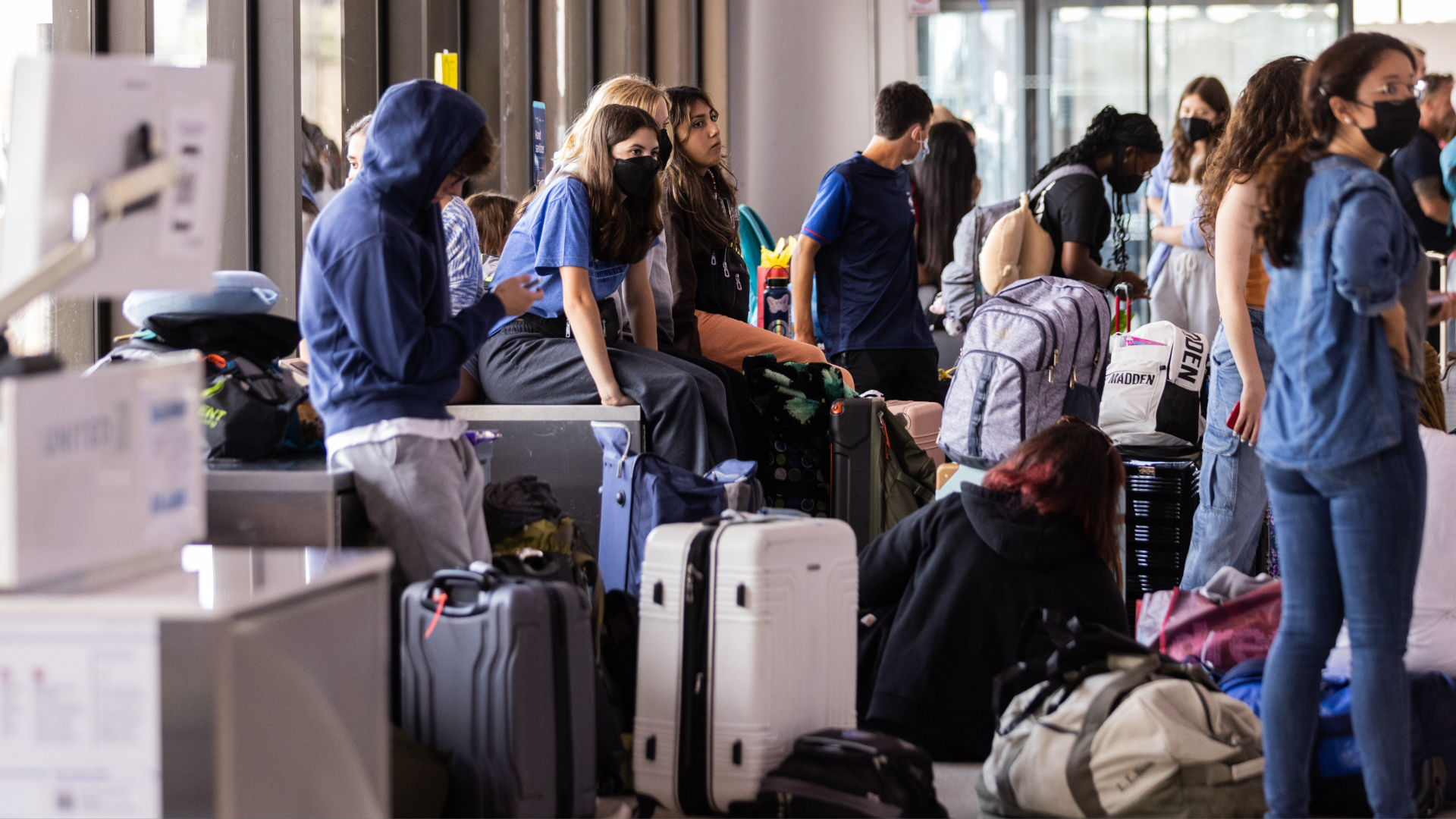 Image of passengers waiting for delayed flights at Newark Liberty International Airport