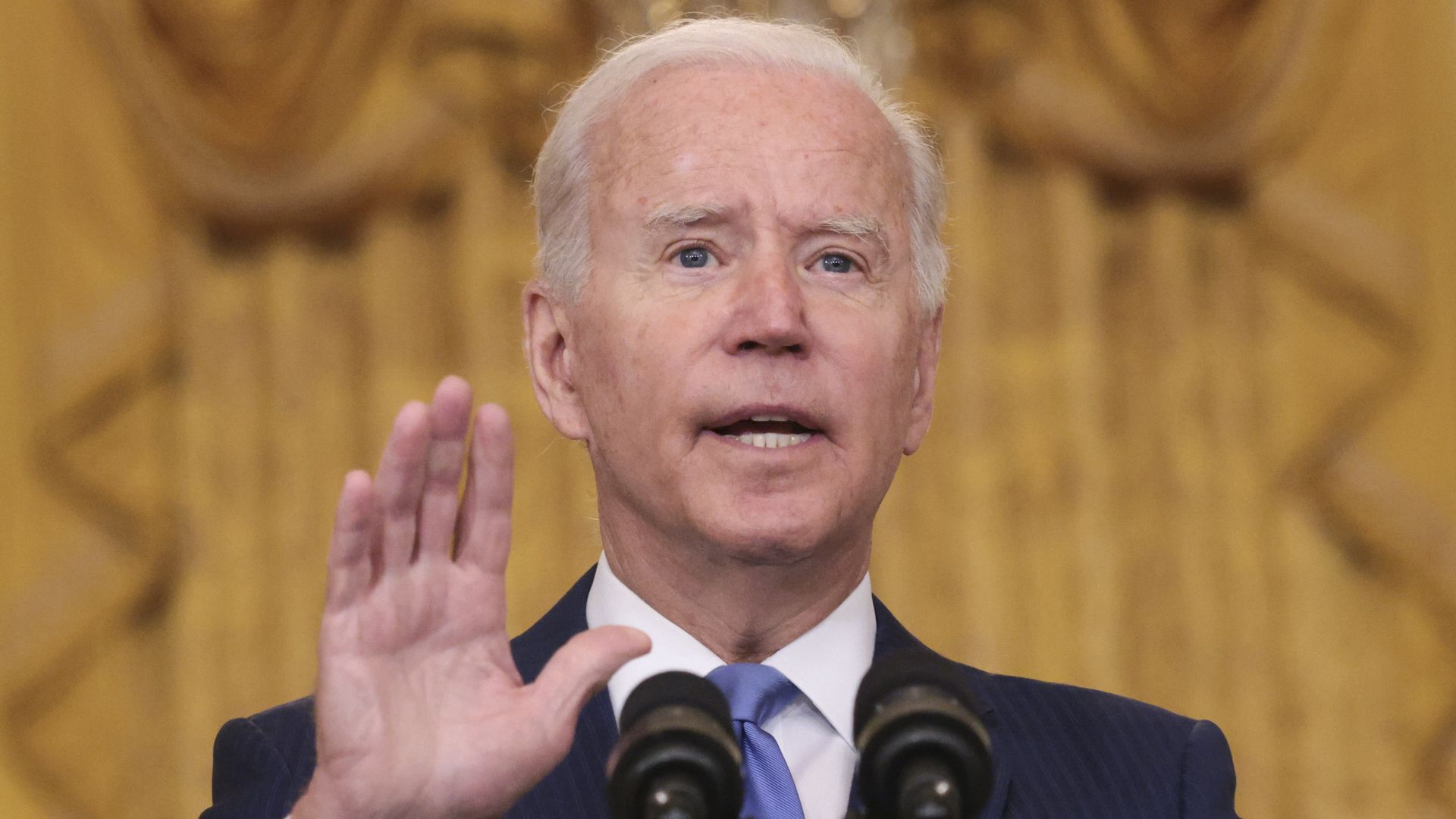 U.S President Joe Biden speaks during an event in the East Room of the White House 