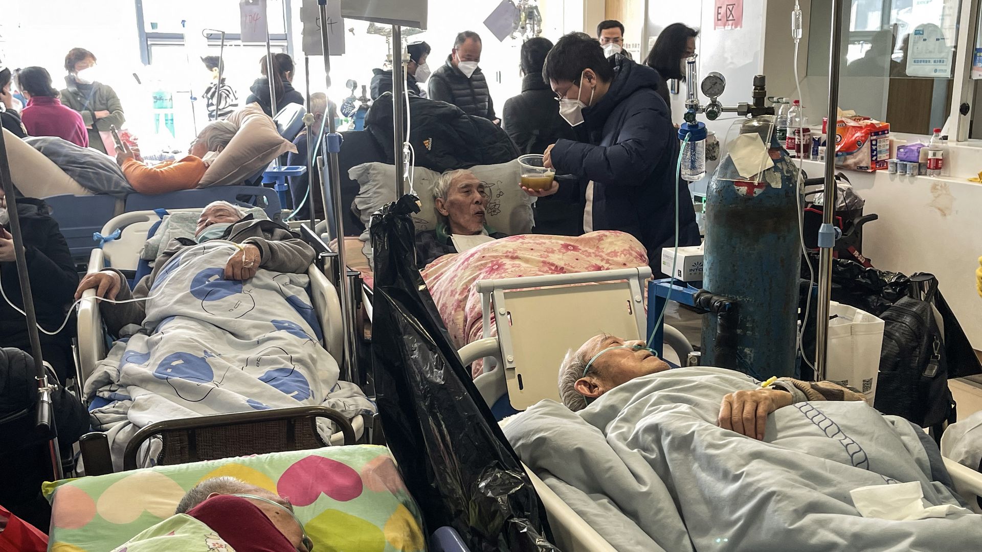 Patients on stretchers are seen at Tongren hospital in Shanghai on January 3, 2023.