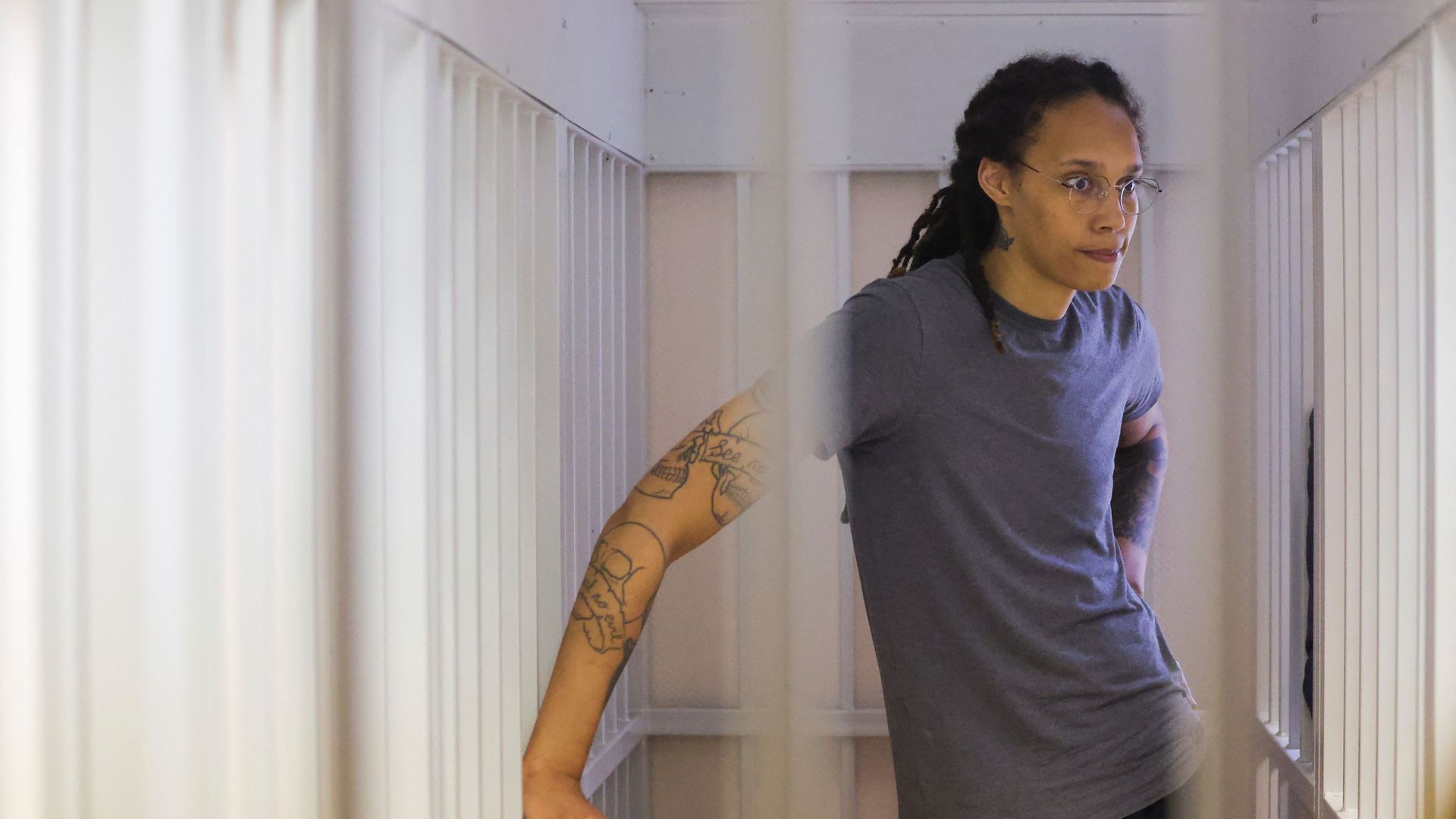 US' Women's National Basketball Association (WNBA) basketball player Brittney Griner inside a defendants' cage during a hearing in Khimki outside Moscow, on August 4, 2022
