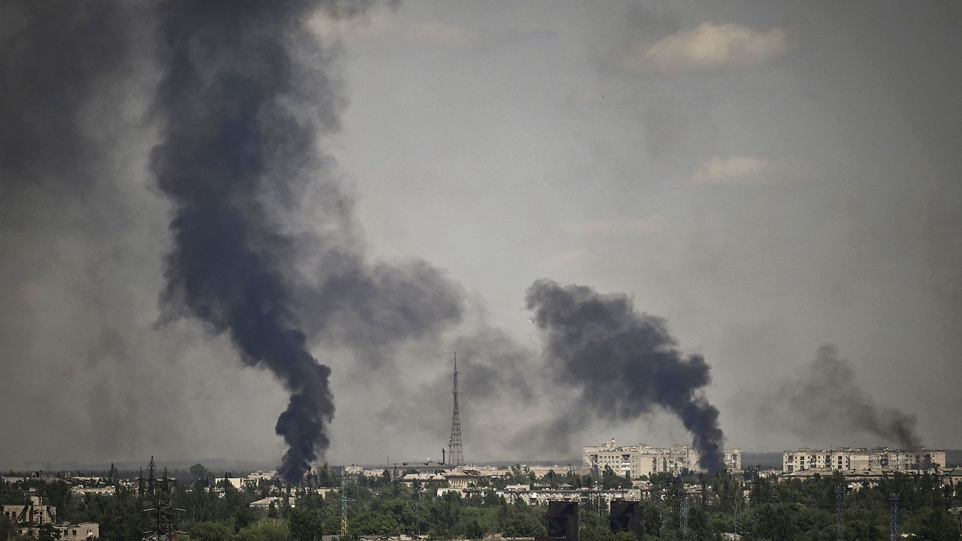 Smoke rises in the city of Severodonetsk during heavy fightings between Ukrainian and Russian troops at eastern Ukrainian region of Donbas on May 30.