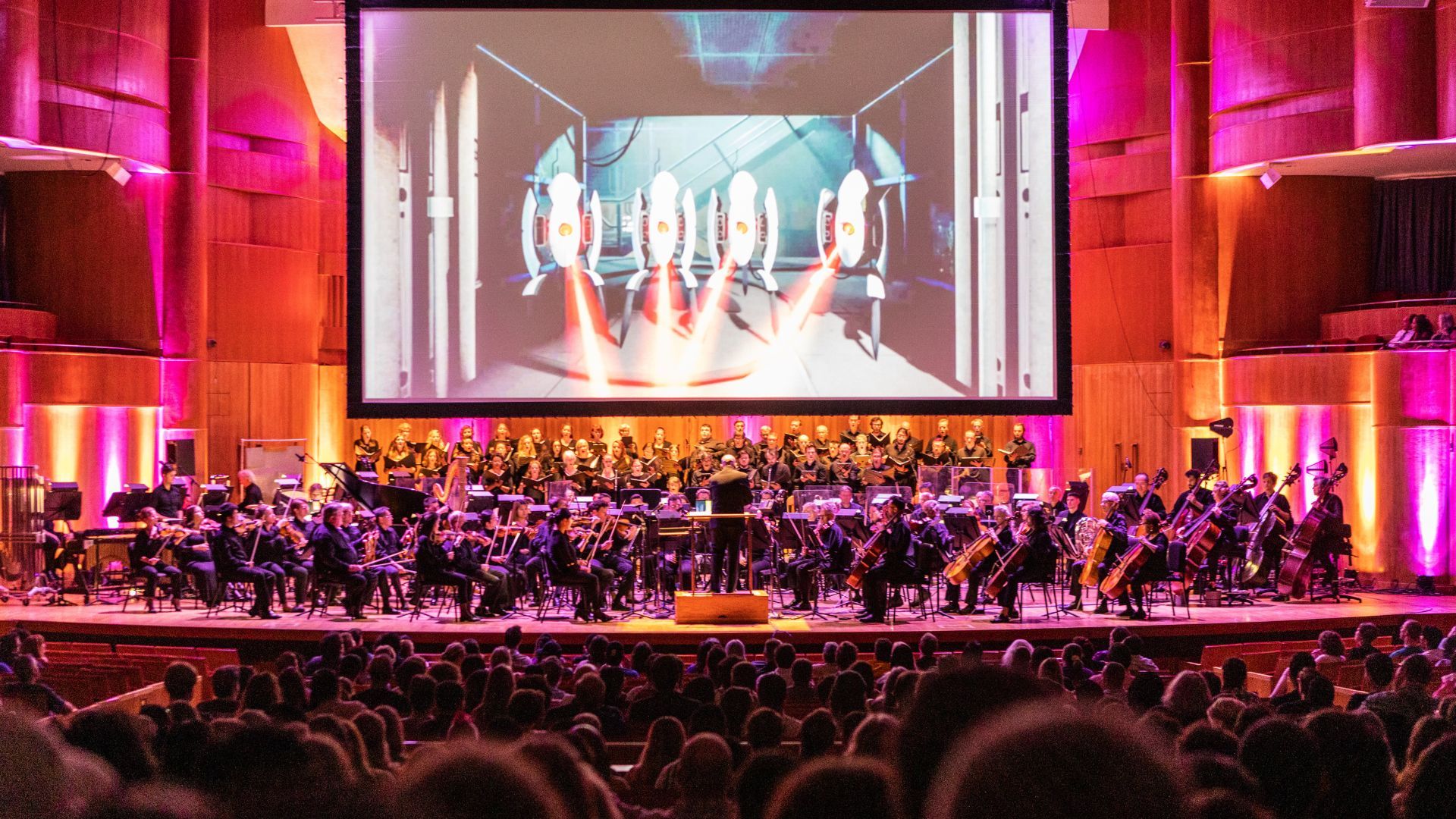 An orchestra on a stage. 