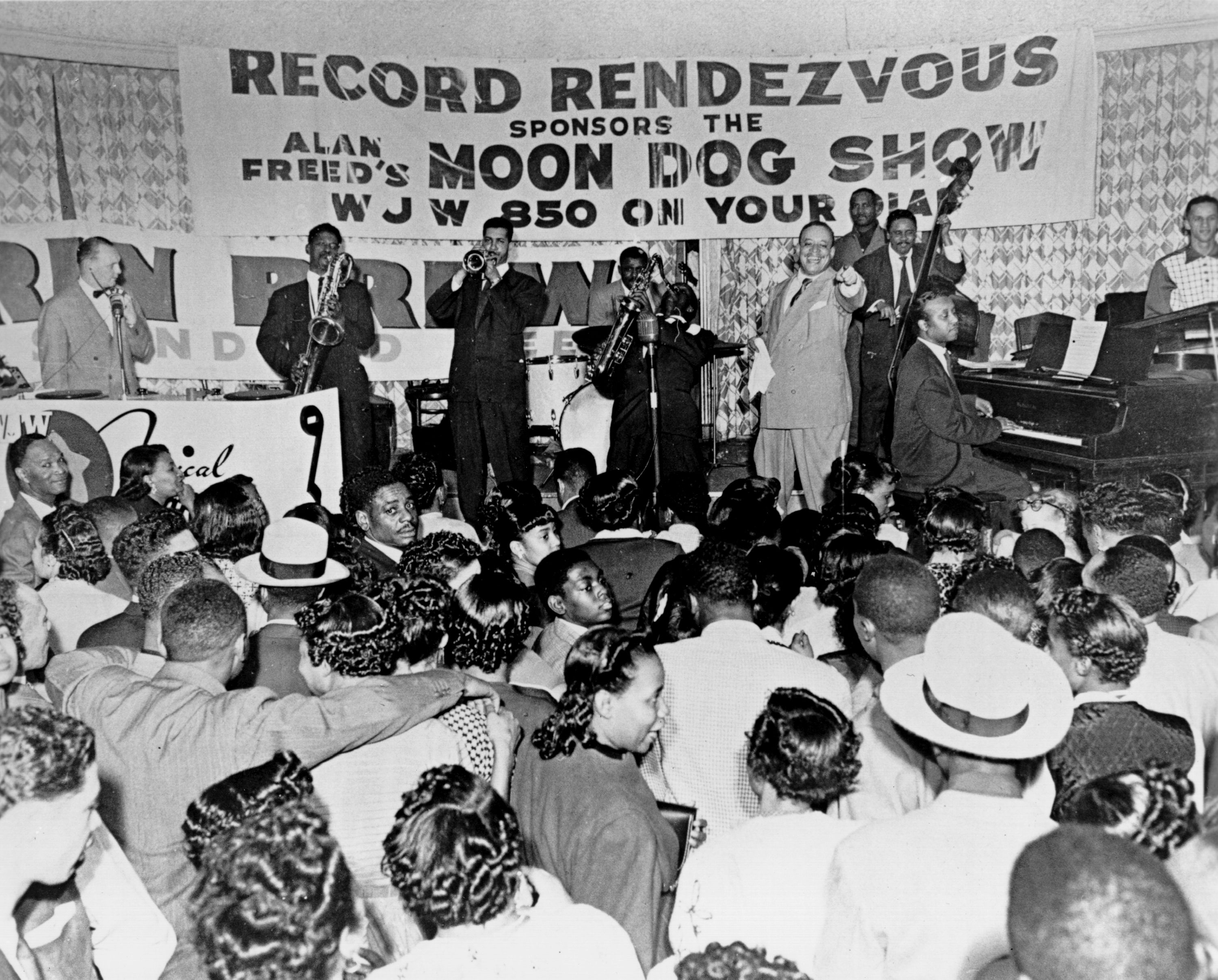 Black and white photo of a 1950s rock show. 