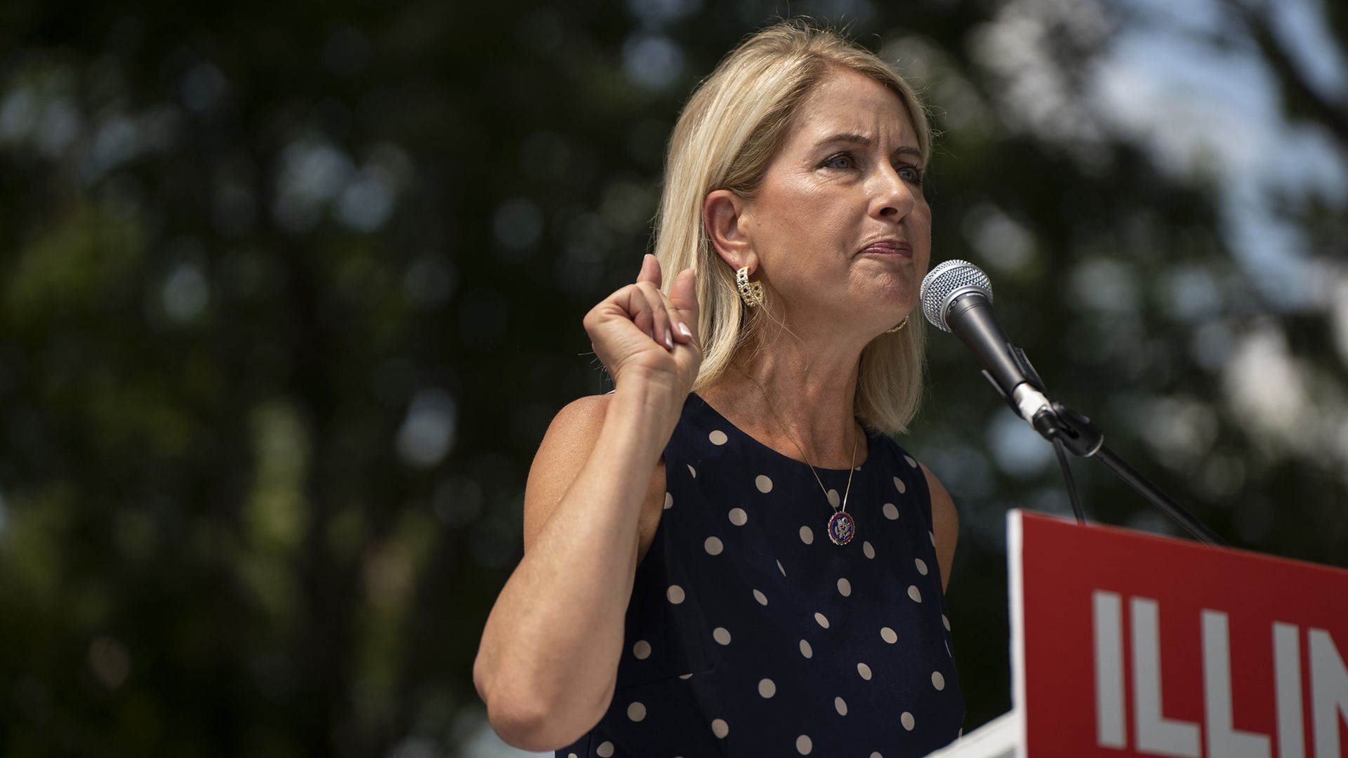 Female politician at a podium